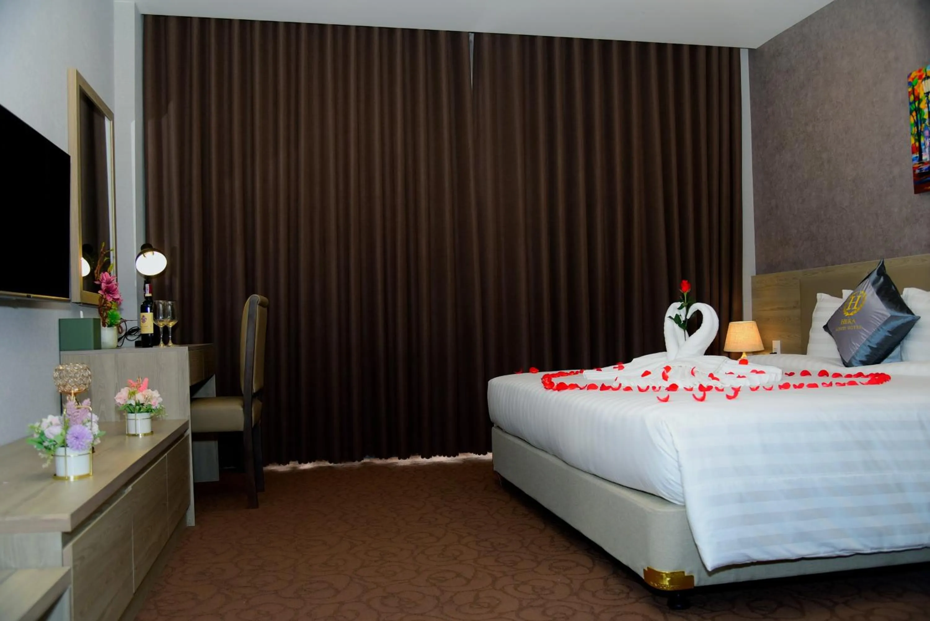 Bed in Hera Luxury Hotel