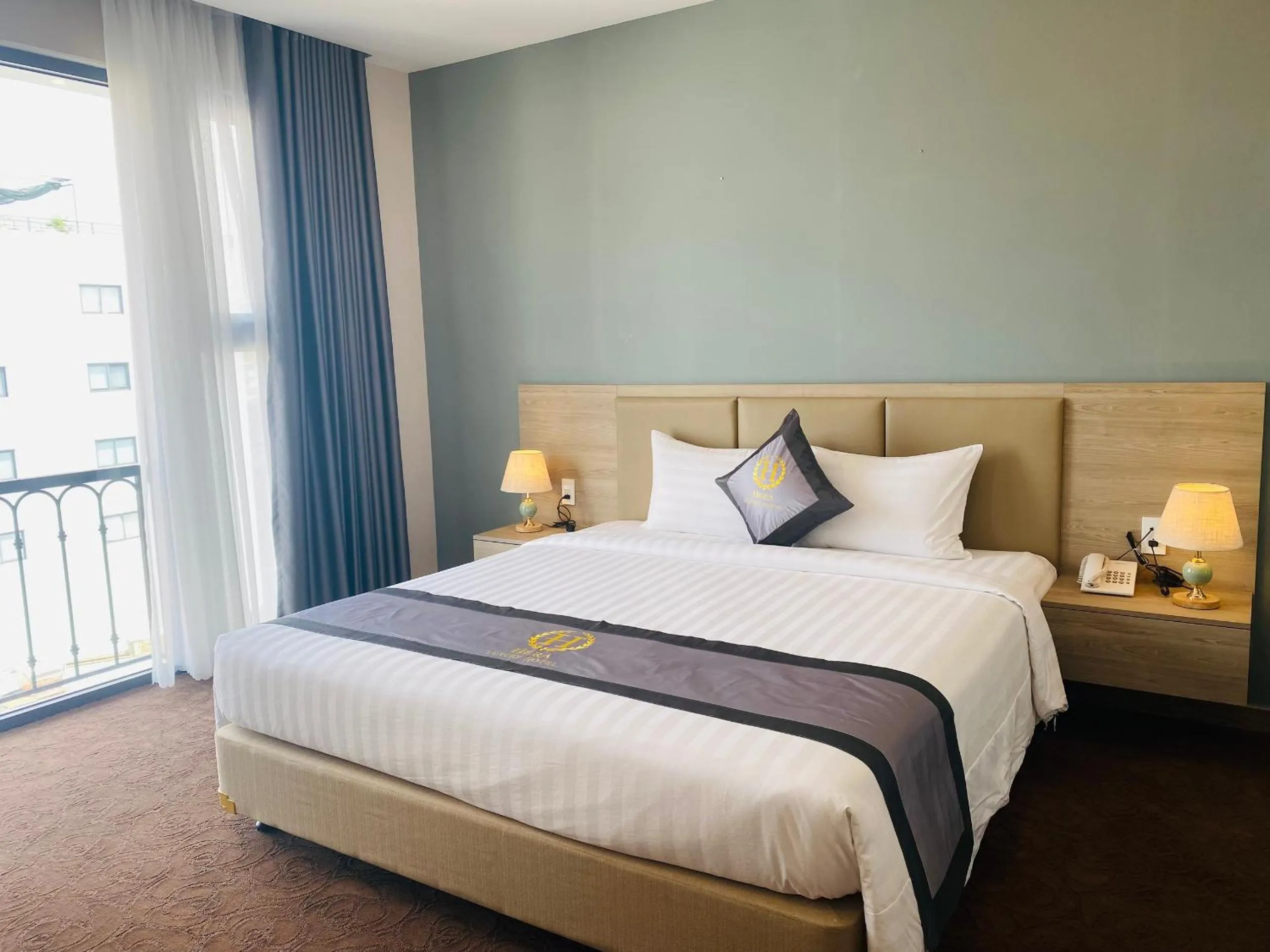 Bed in Hera Luxury Hotel