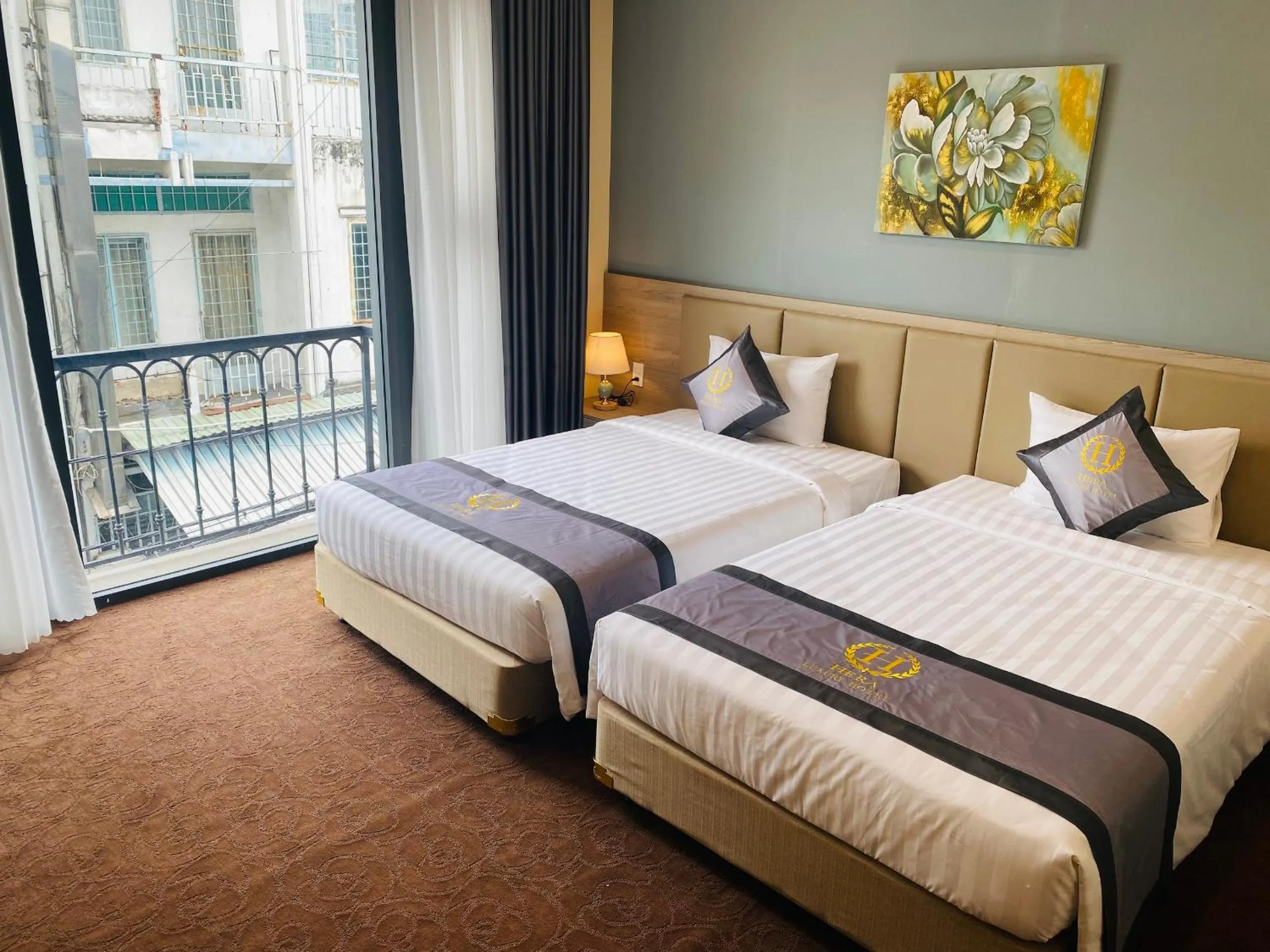 Bed in Hera Luxury Hotel