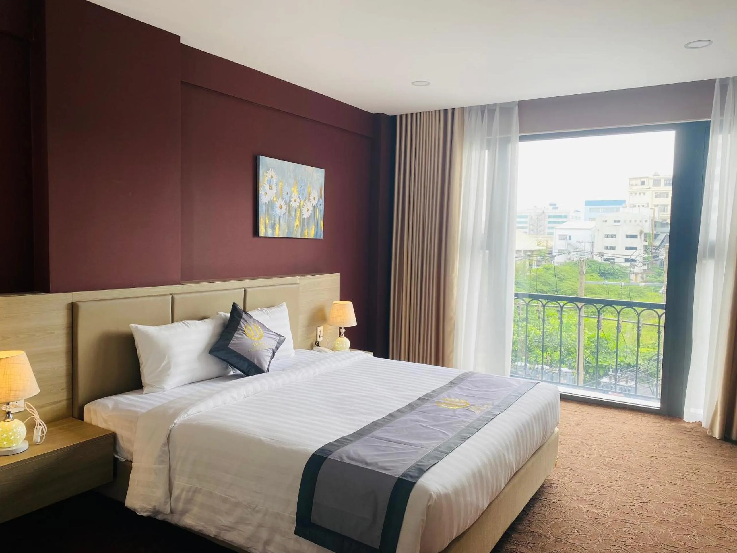 Bed in Hera Luxury Hotel