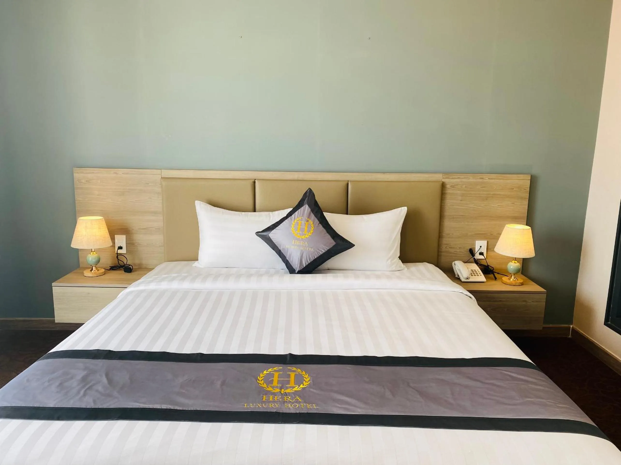 Bed in Hera Luxury Hotel