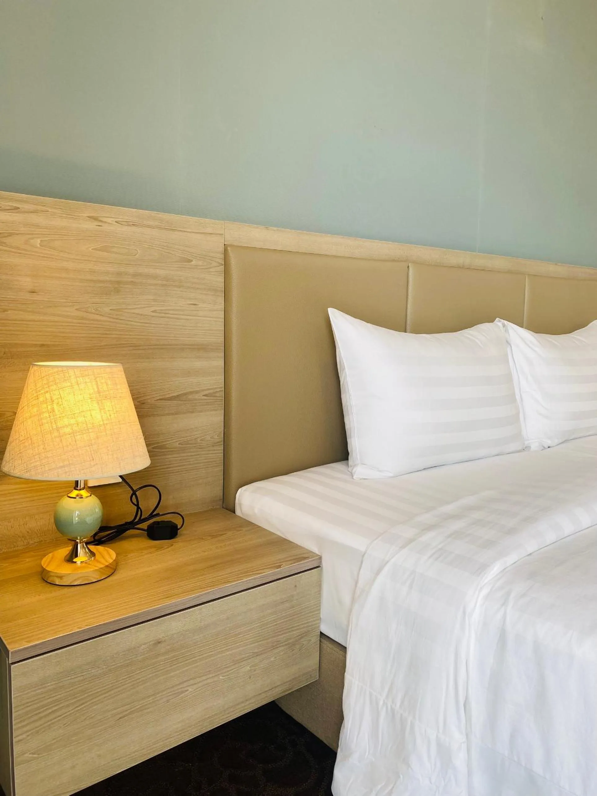 Bed in Hera Luxury Hotel