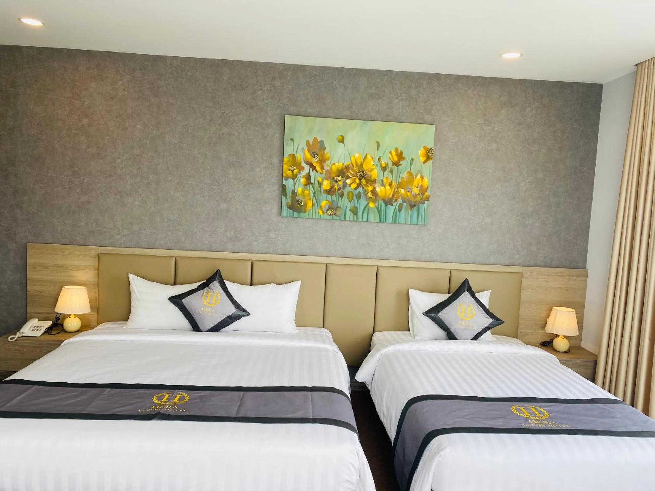 Bed in Hera Luxury Hotel