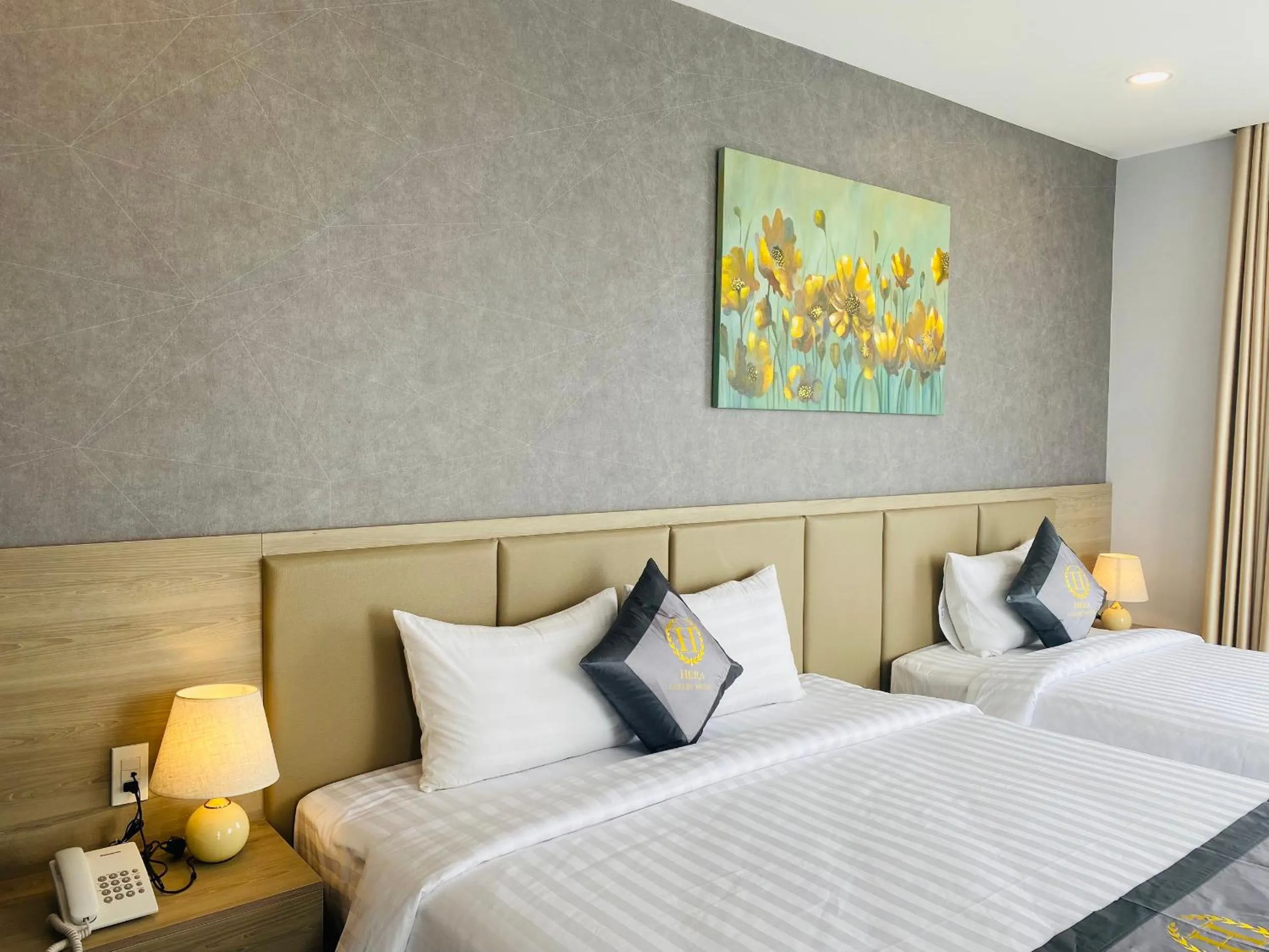 Bed in Hera Luxury Hotel