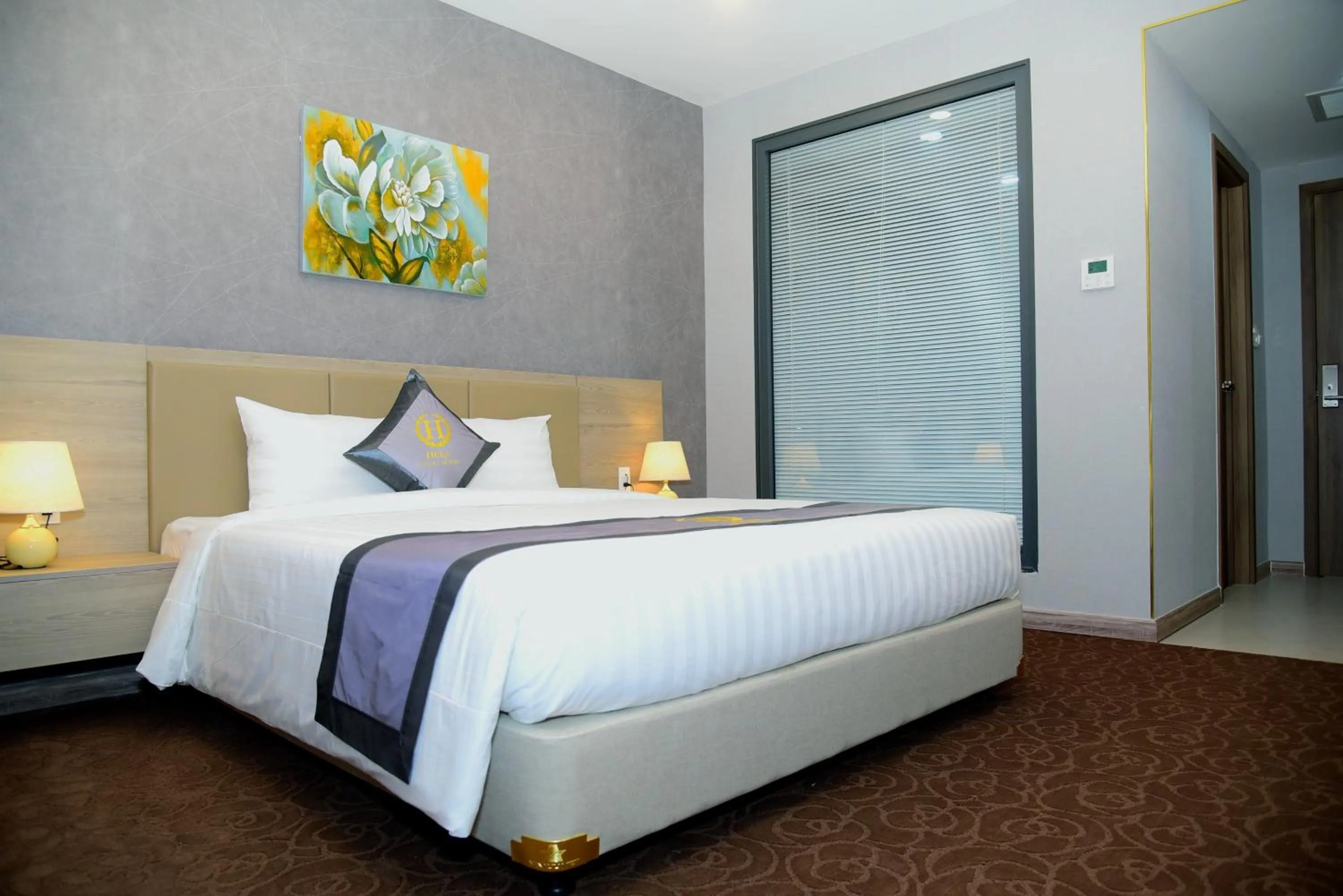 Bed in Hera Luxury Hotel