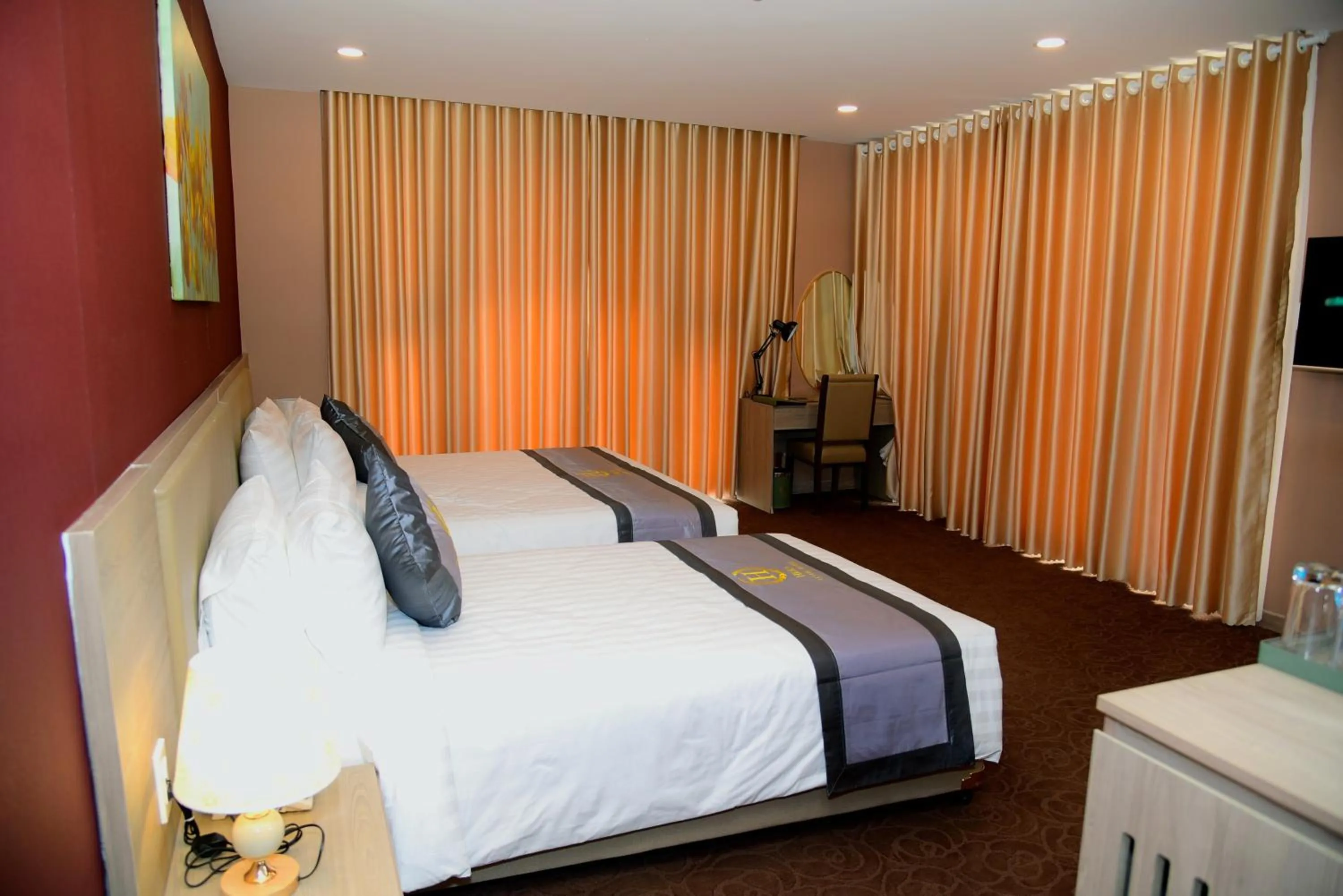 Bed in Hera Luxury Hotel