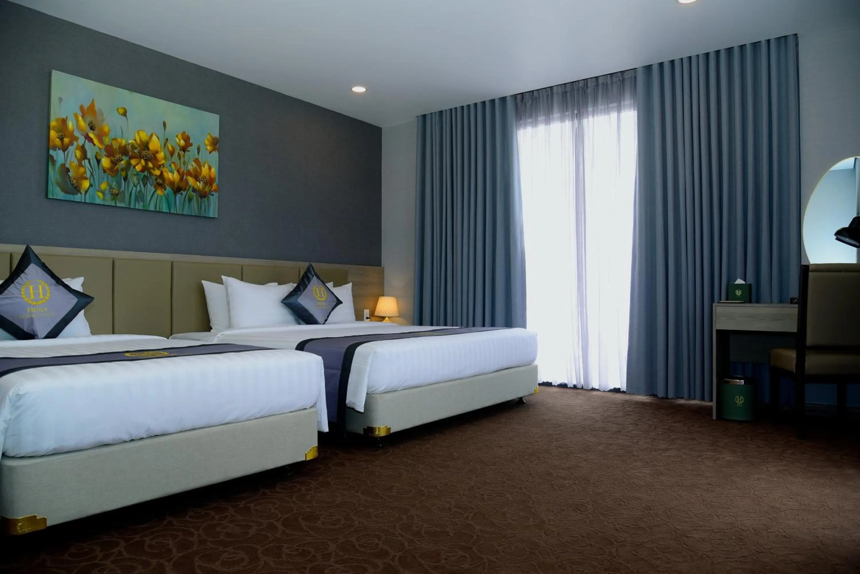 Bed in Hera Luxury Hotel