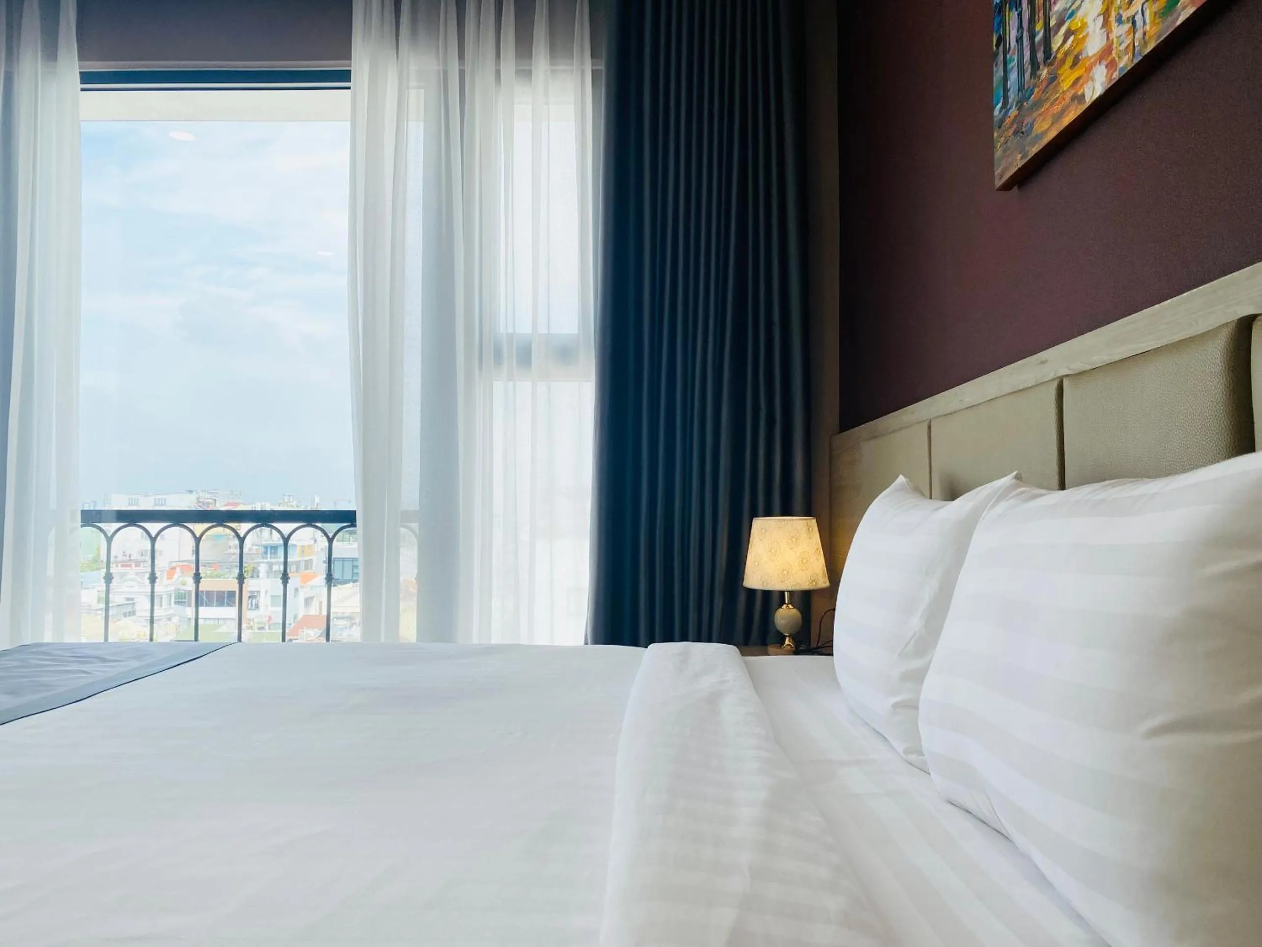 Bed in Hera Luxury Hotel