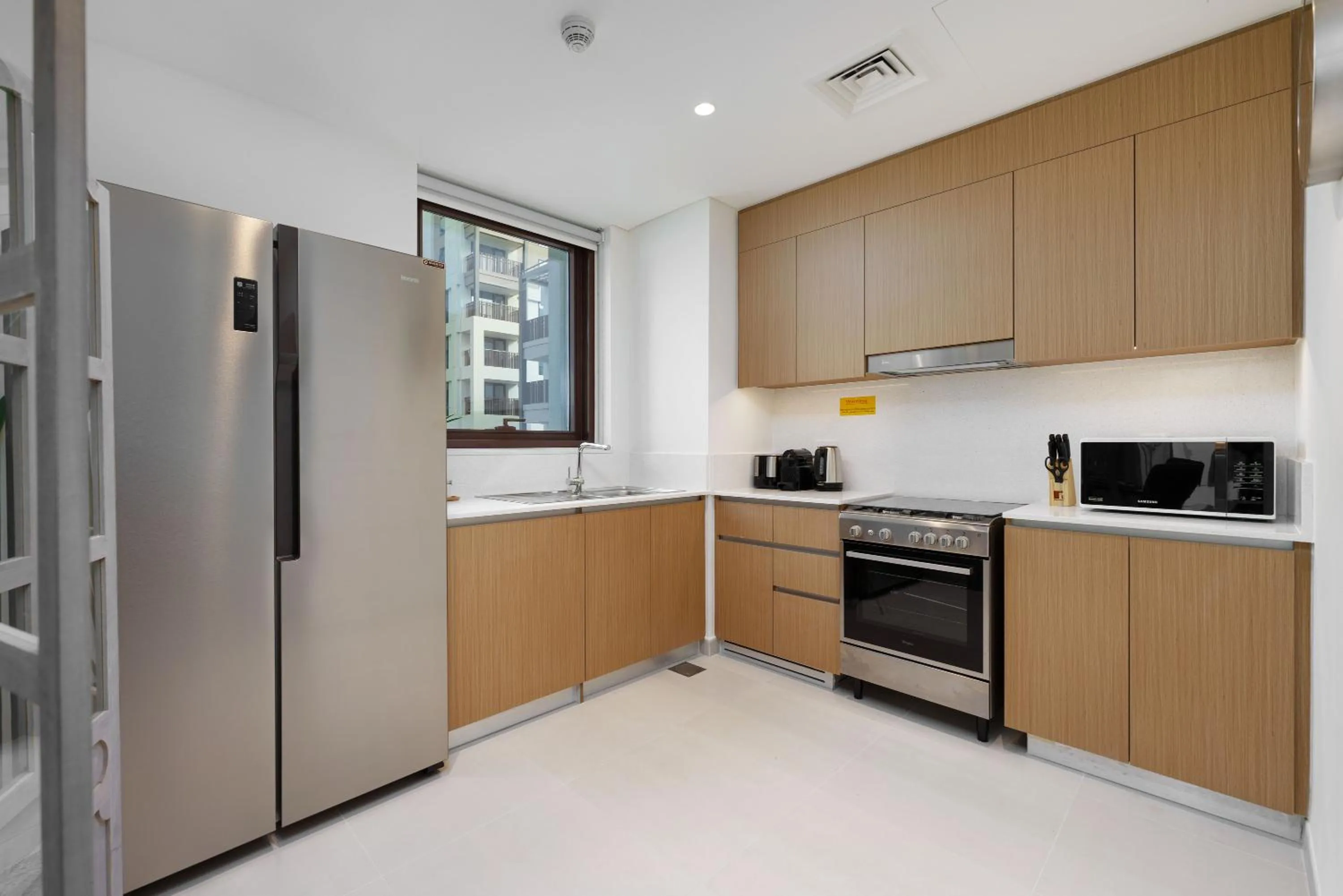 kitchen in Maison Privee - Alluring Modern Apt in Dubai Creek Beach