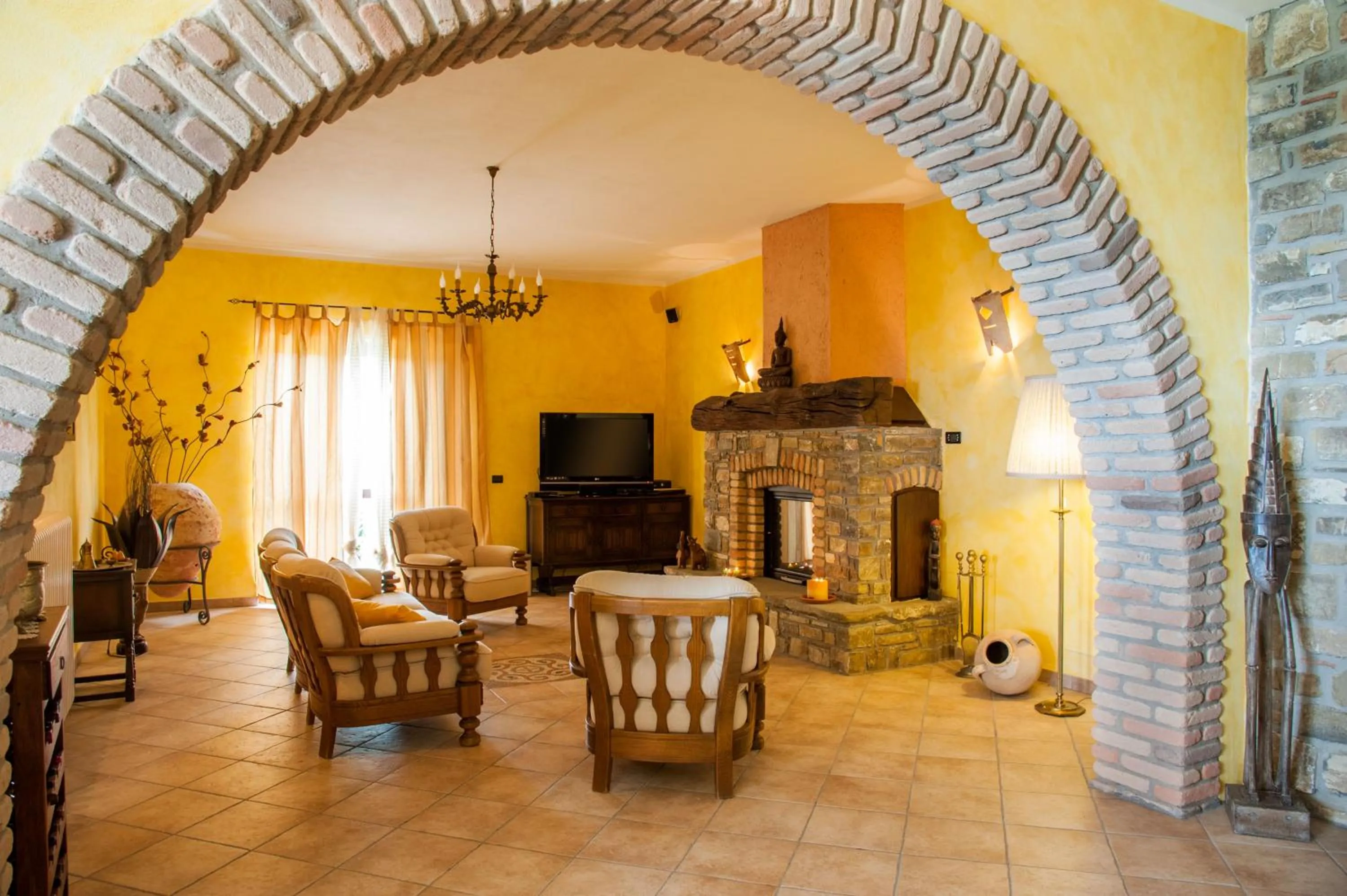 Communal lounge/ TV room in Villa Bernadette