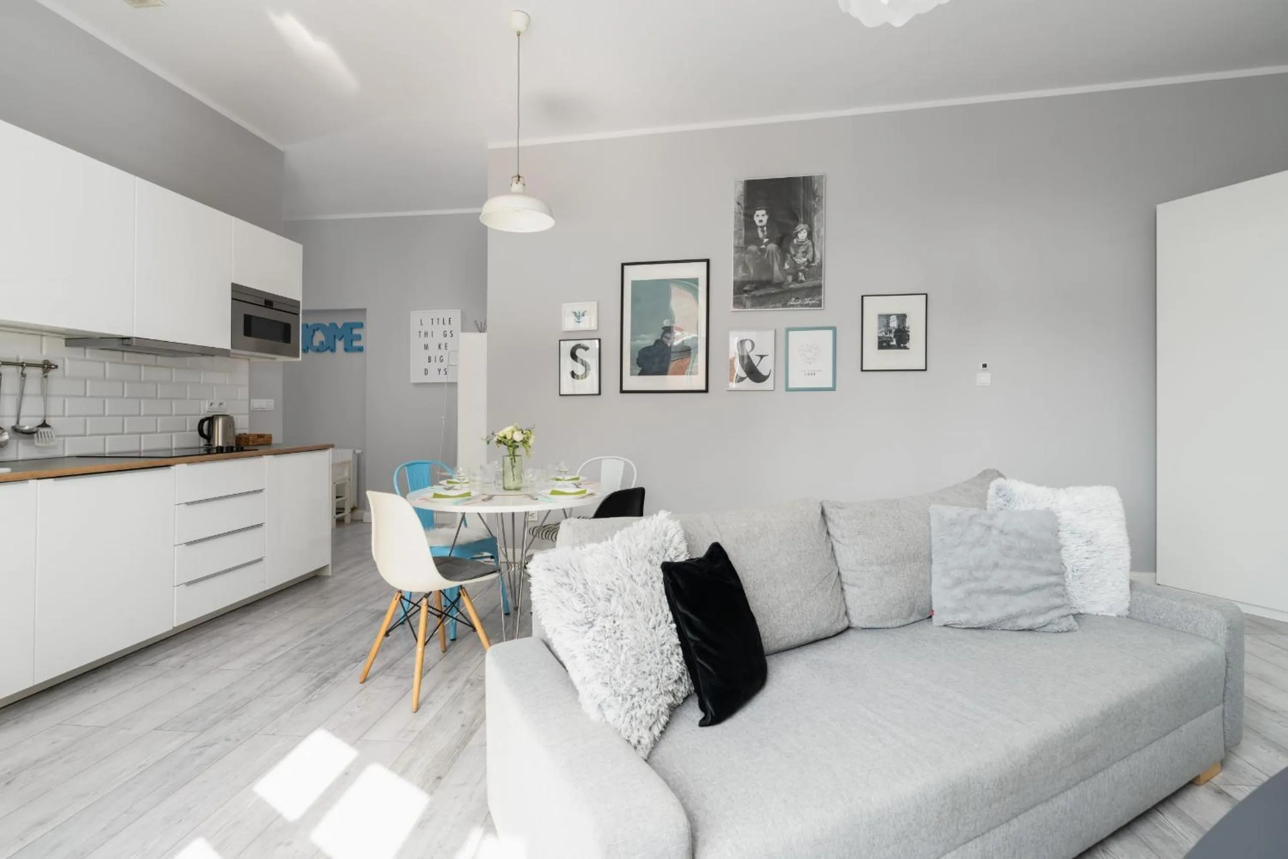 Communal lounge/ TV room in Scandi Małe Garbary Apartment Piaskowa near Old Market Square by Noclegi Renters