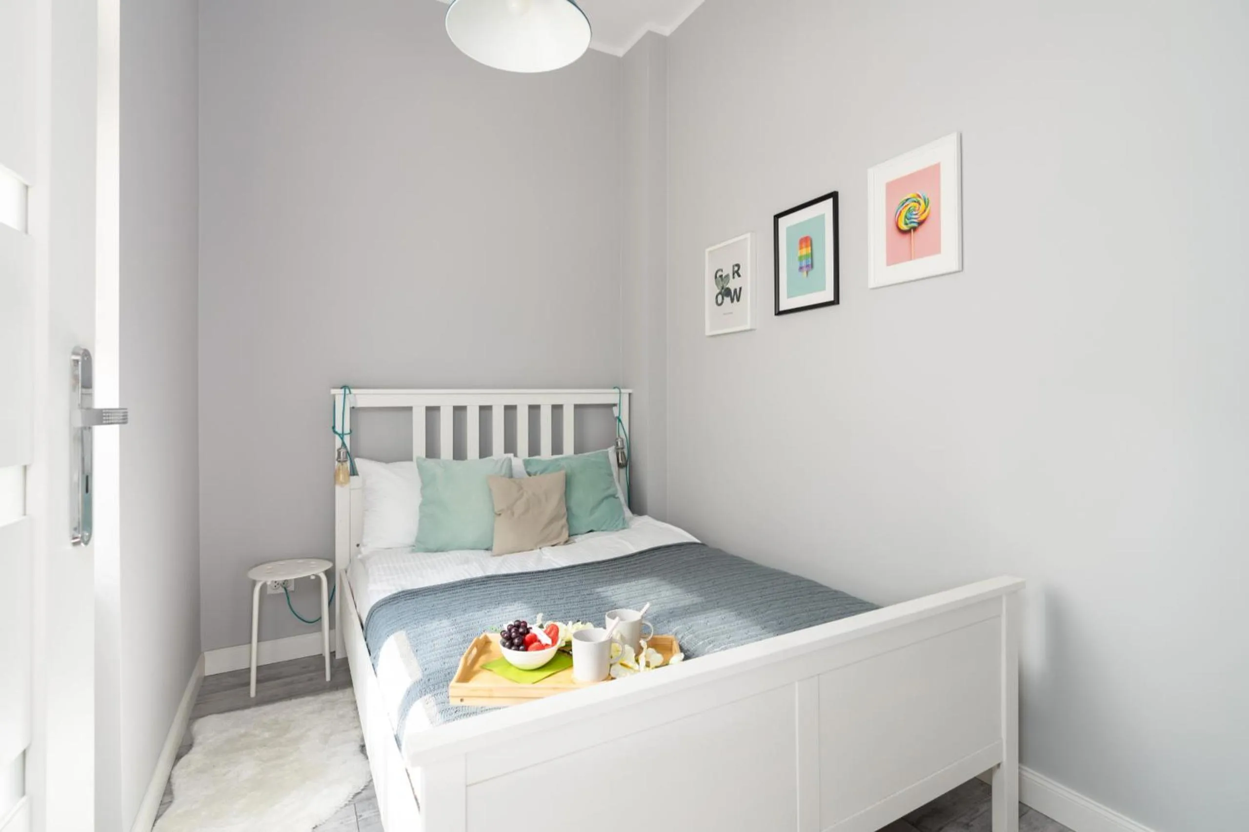 Bed in Scandi Małe Garbary Apartment Piaskowa near Old Market Square by Noclegi Renters