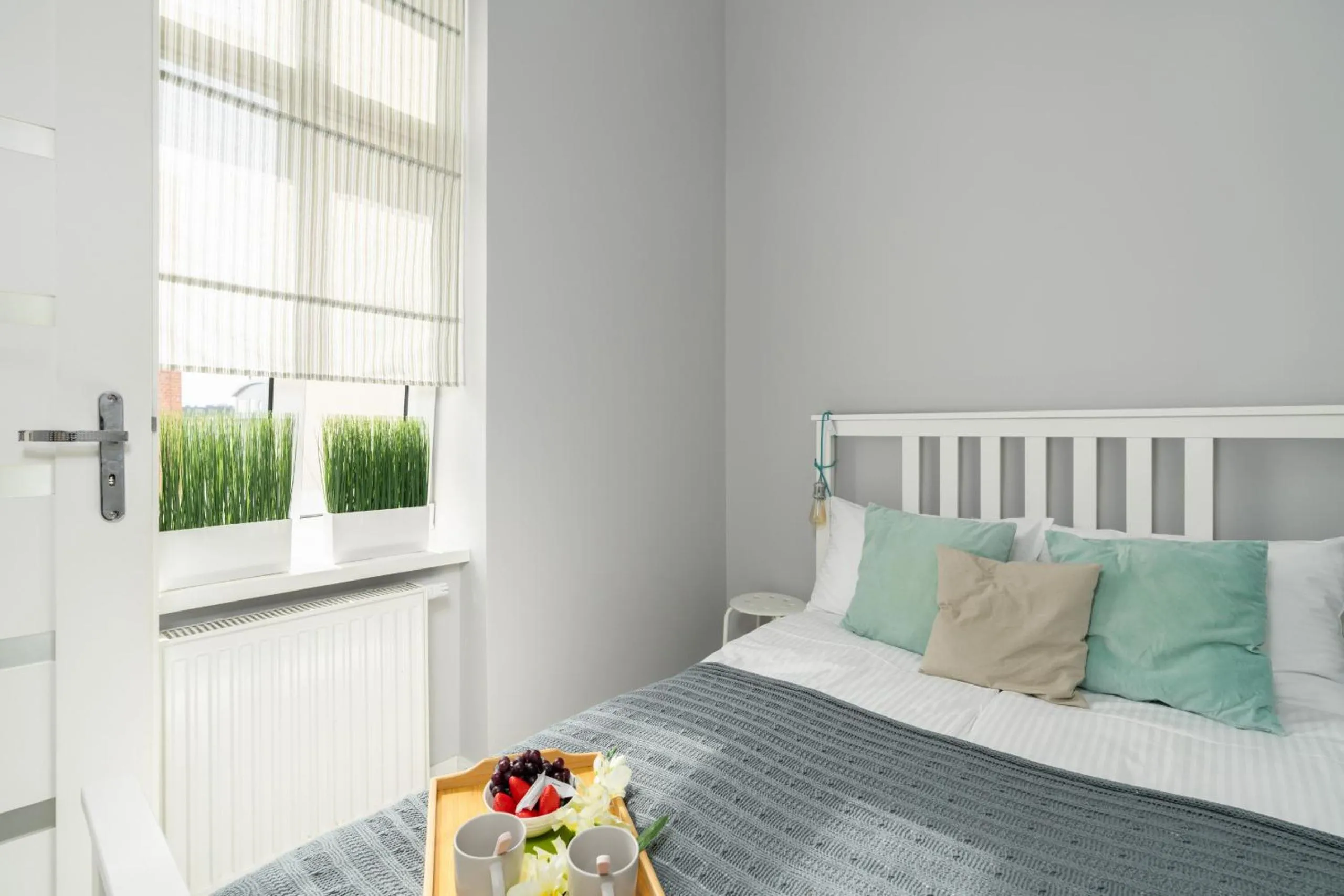 Bed in Scandi Małe Garbary Apartment Piaskowa near Old Market Square by Noclegi Renters