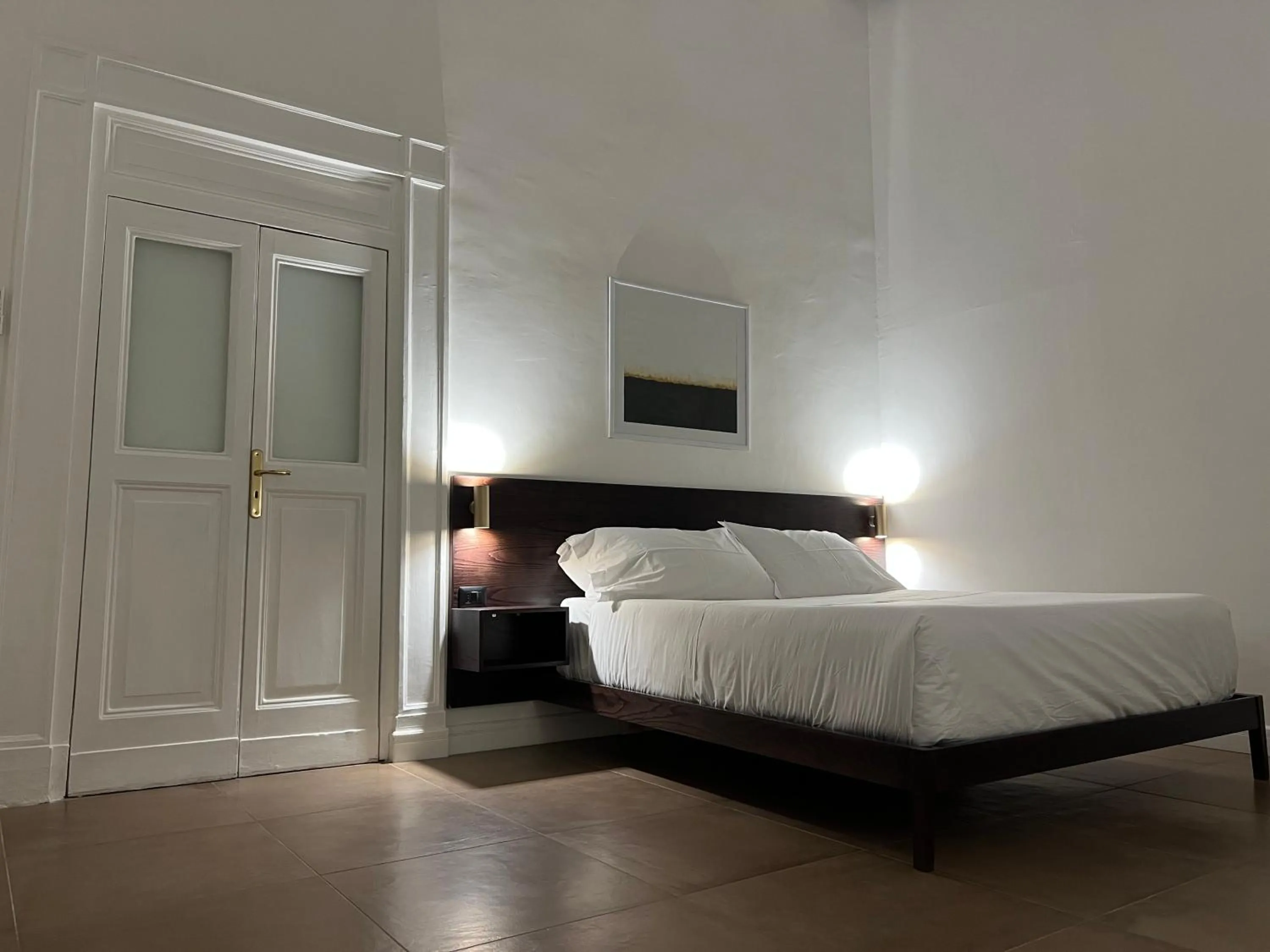 Bed in Domus Delia Luxury Apartment