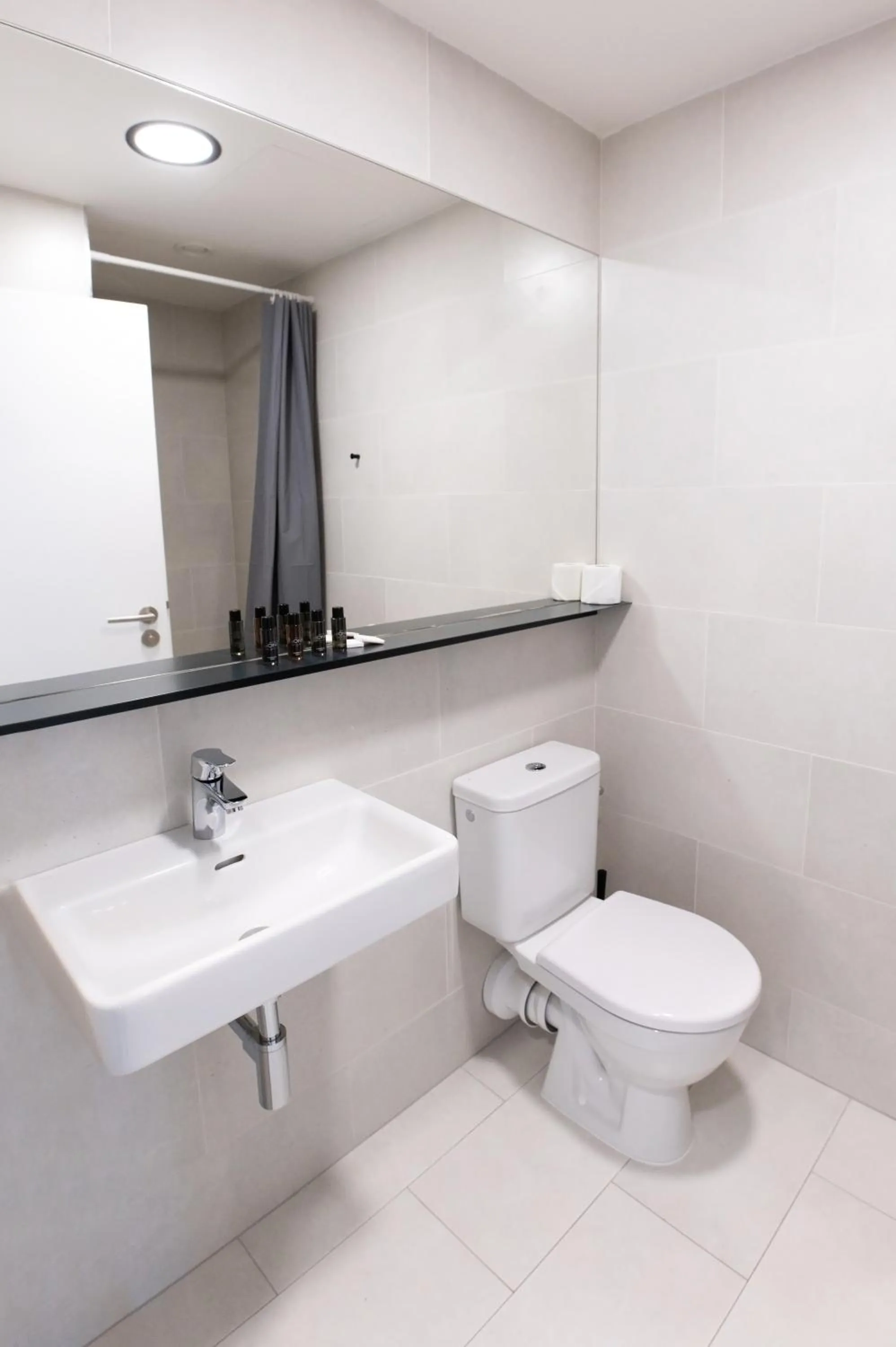 Toilet in Post 120 Suites