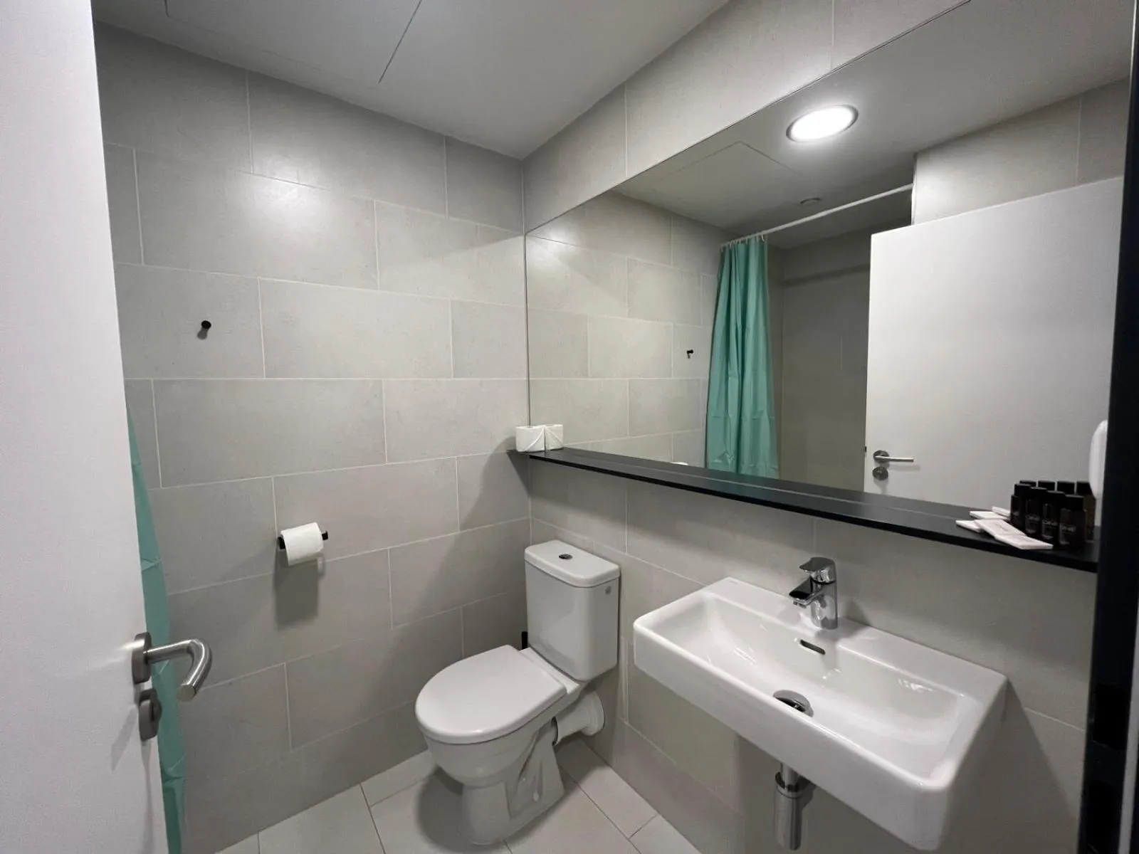 Toilet in Post 120 Suites