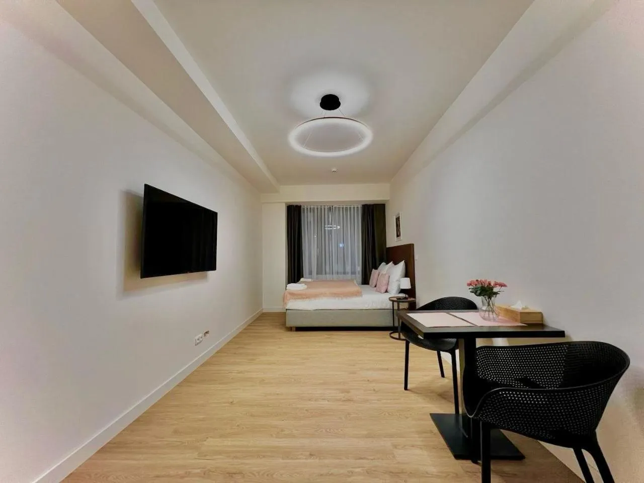 Bed in Post 120 Suites