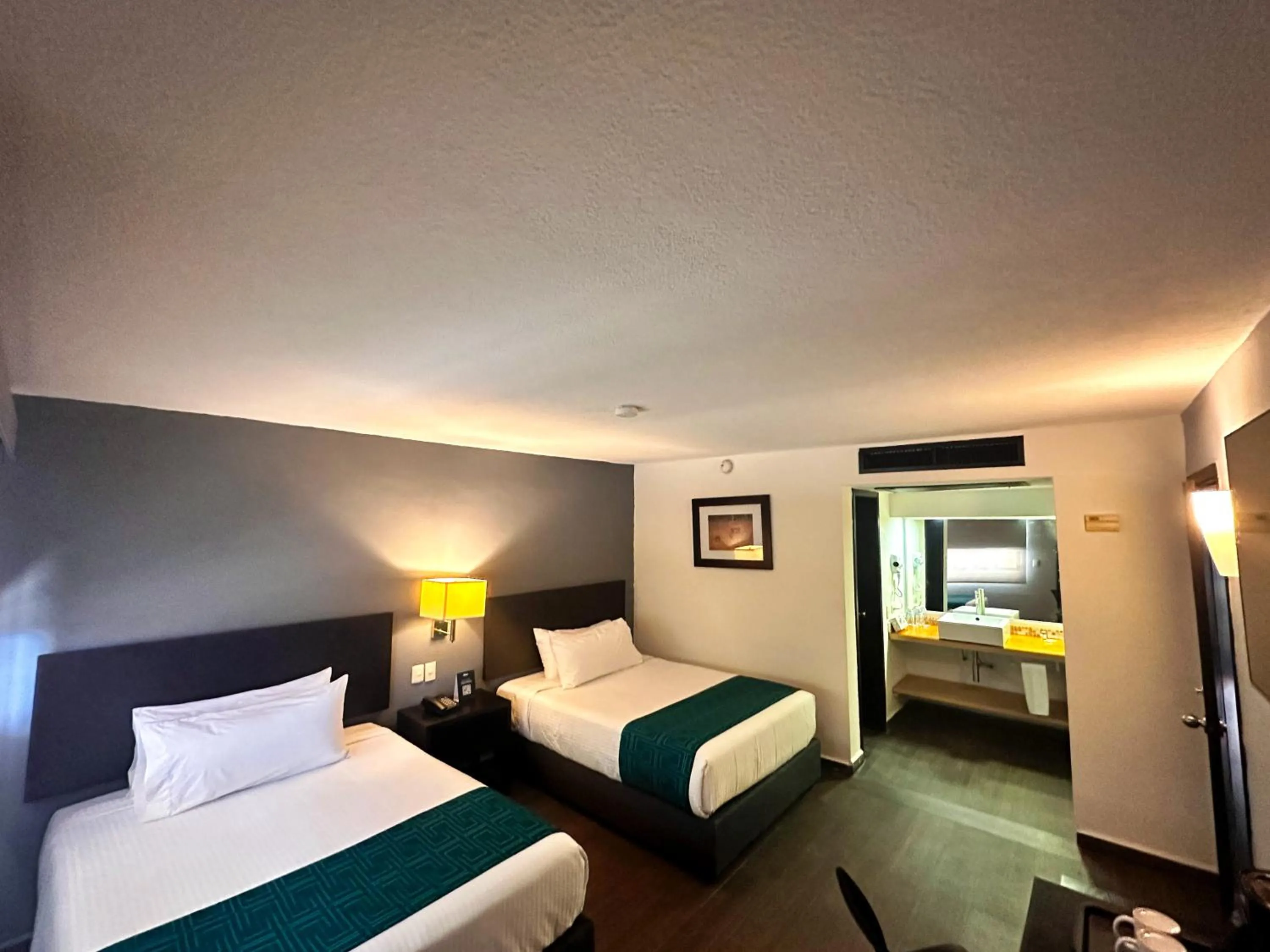 Bed in InHouse Hotel Obregón