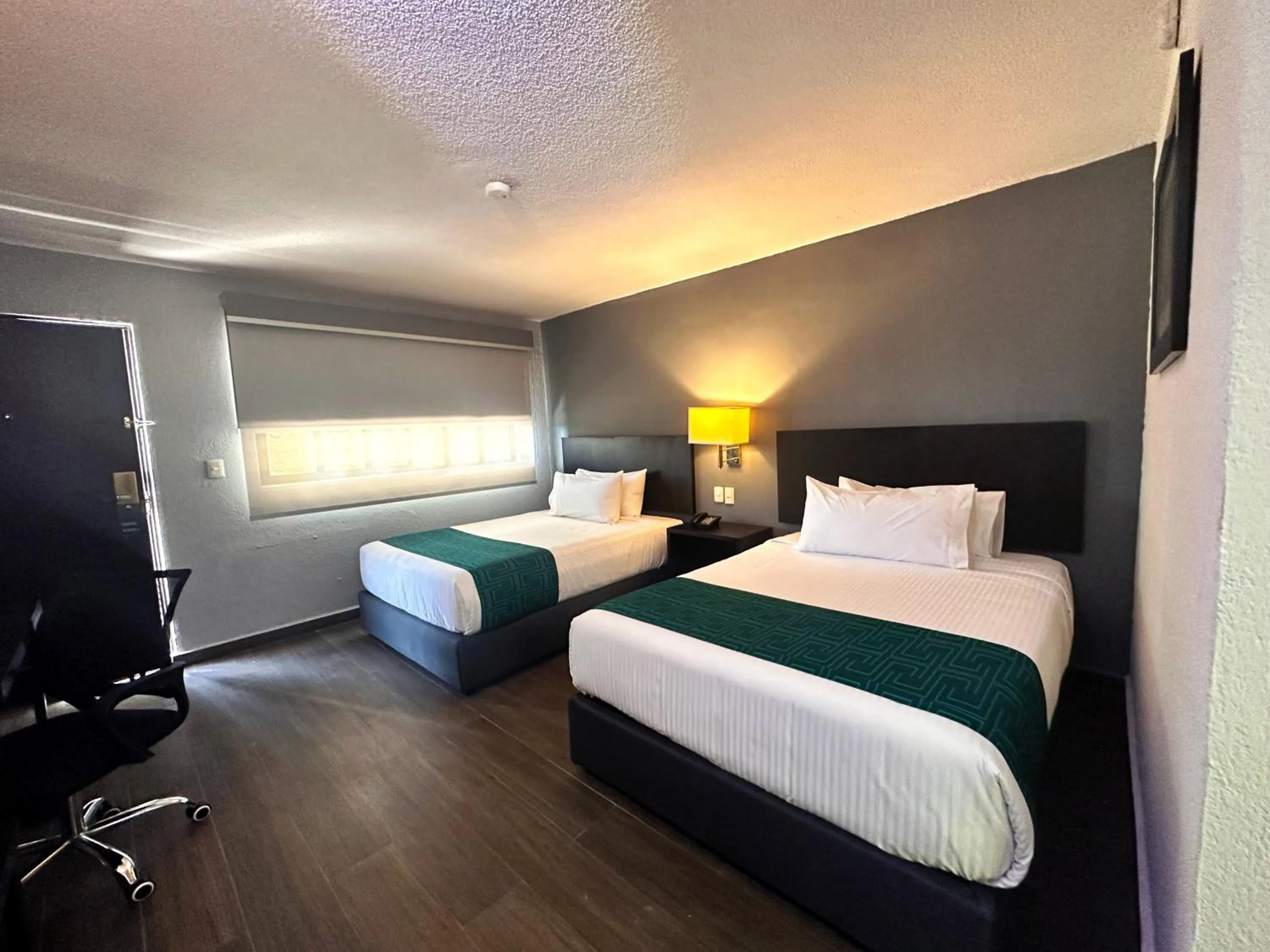 Bed in InHouse Hotel Obregón