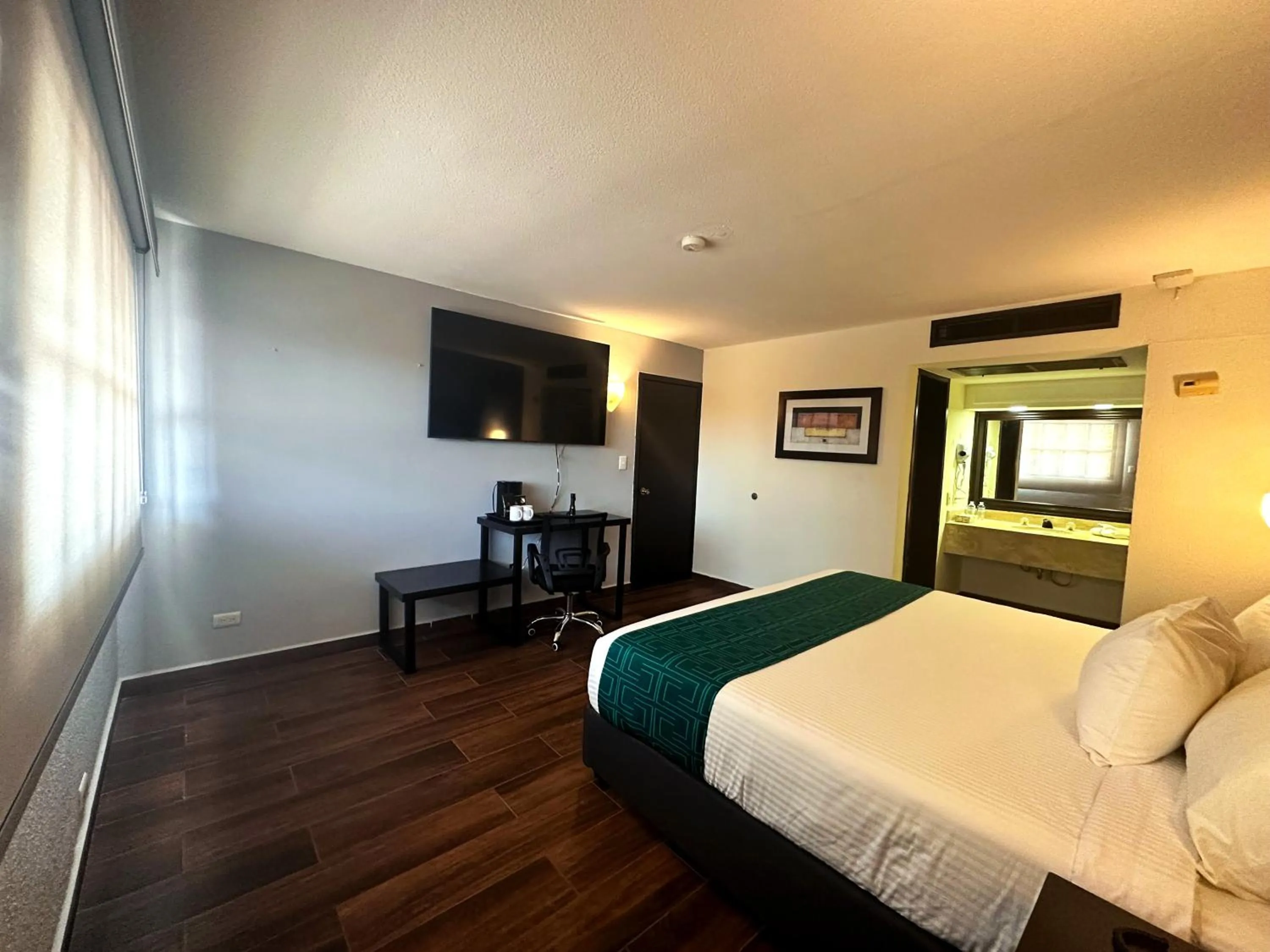 Bed in InHouse Hotel Obregón