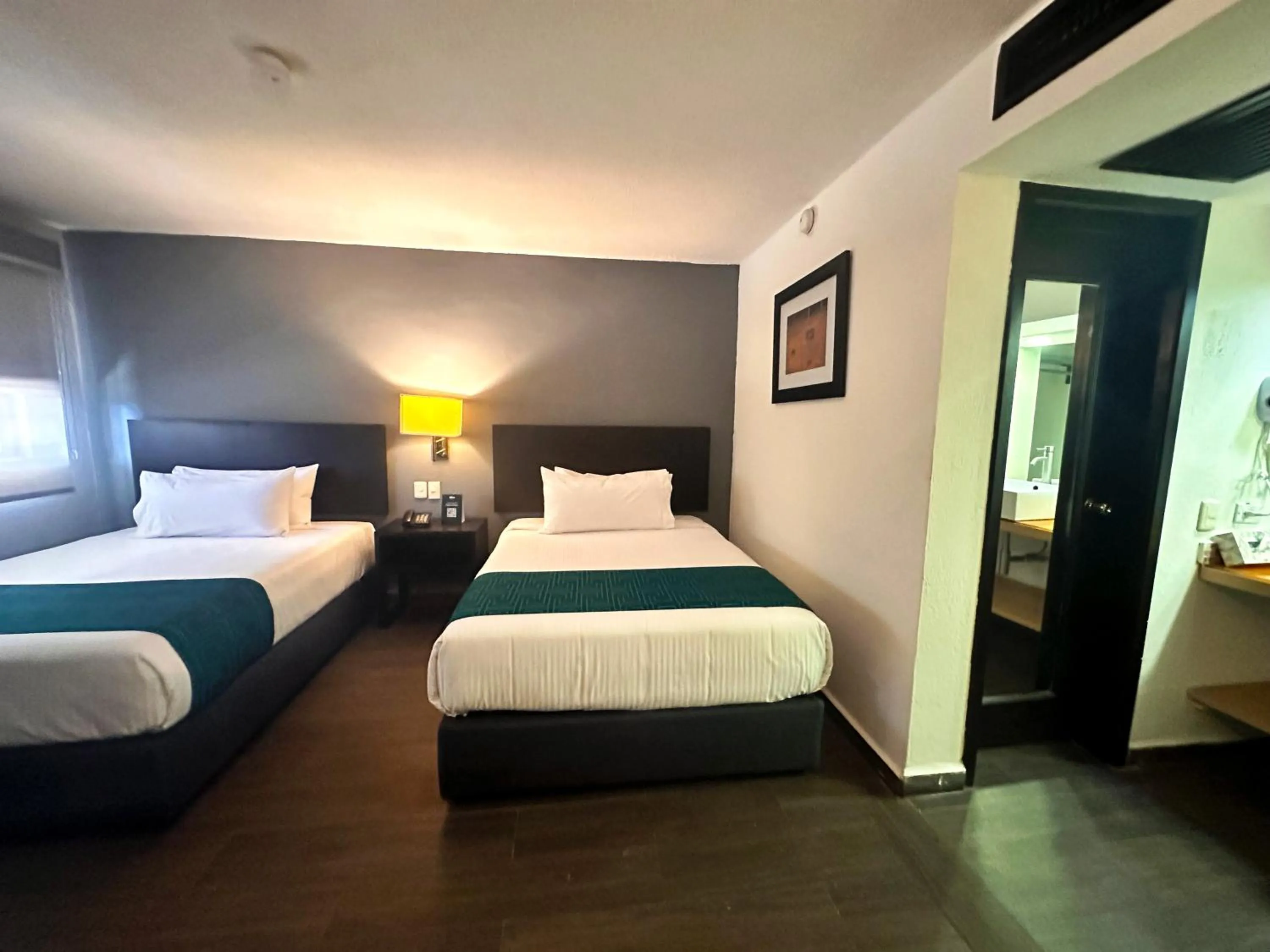 Bed in InHouse Hotel Obregón