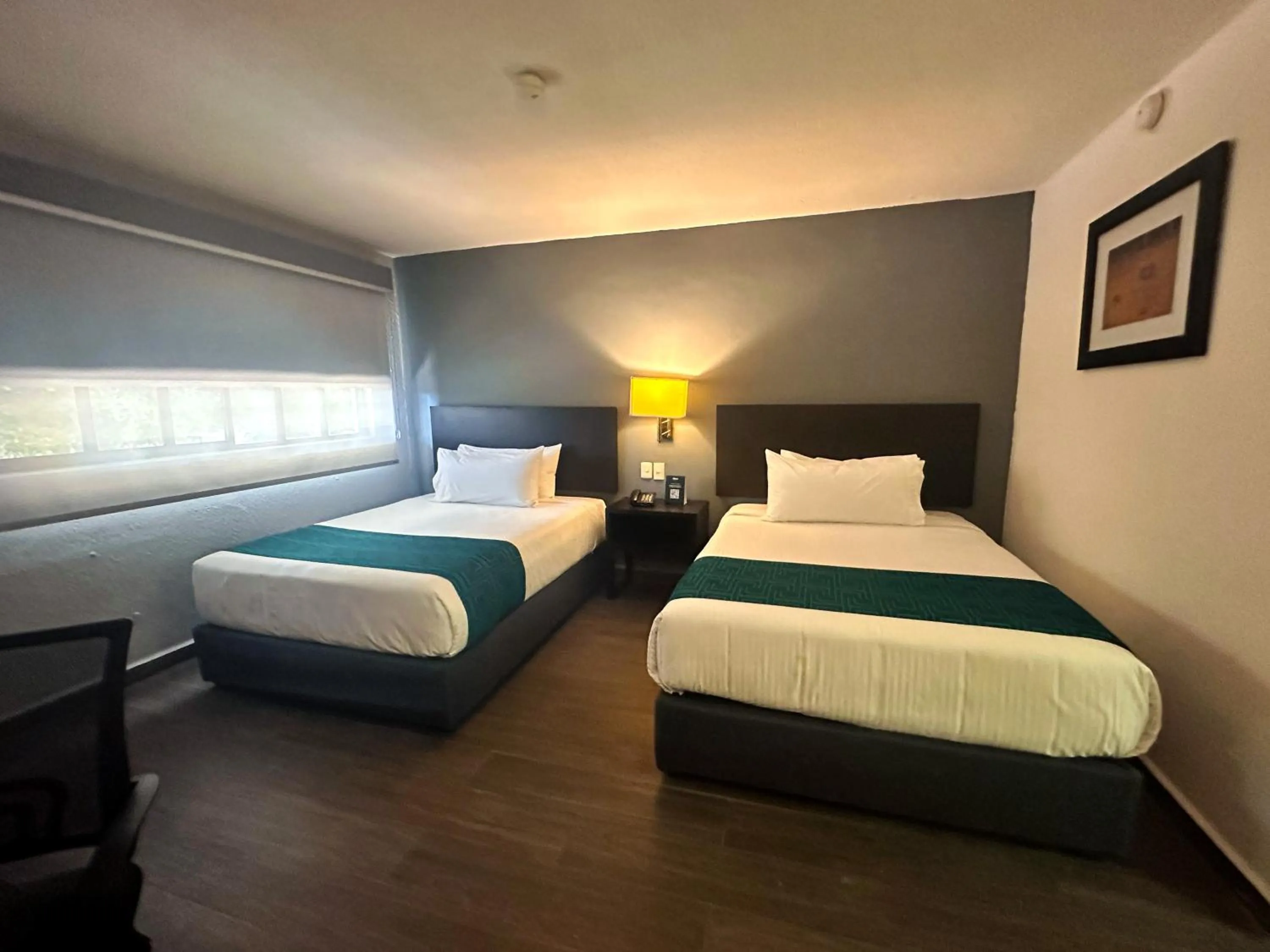 Bed in InHouse Hotel Obregón