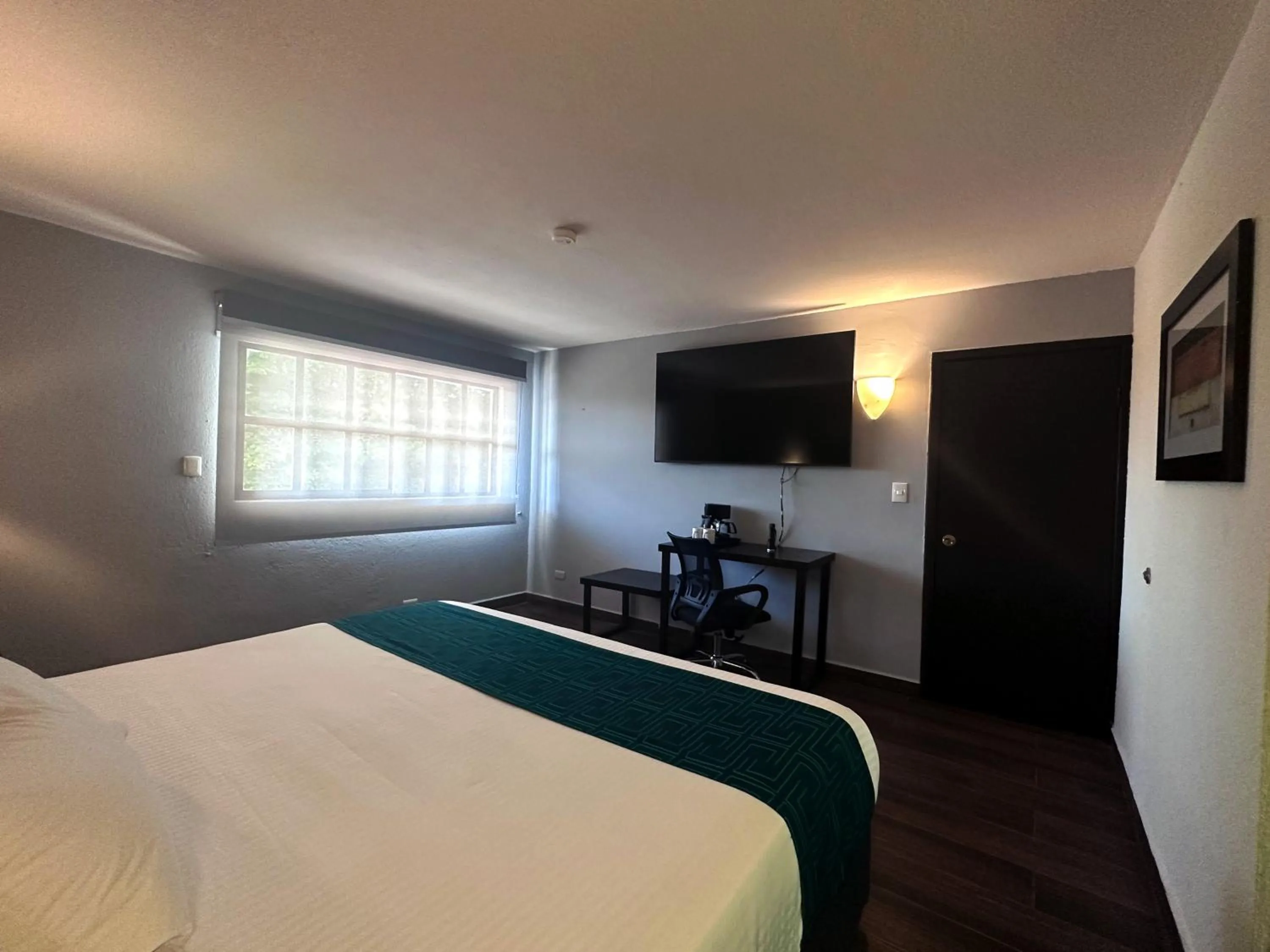 Bed in InHouse Hotel Obregón