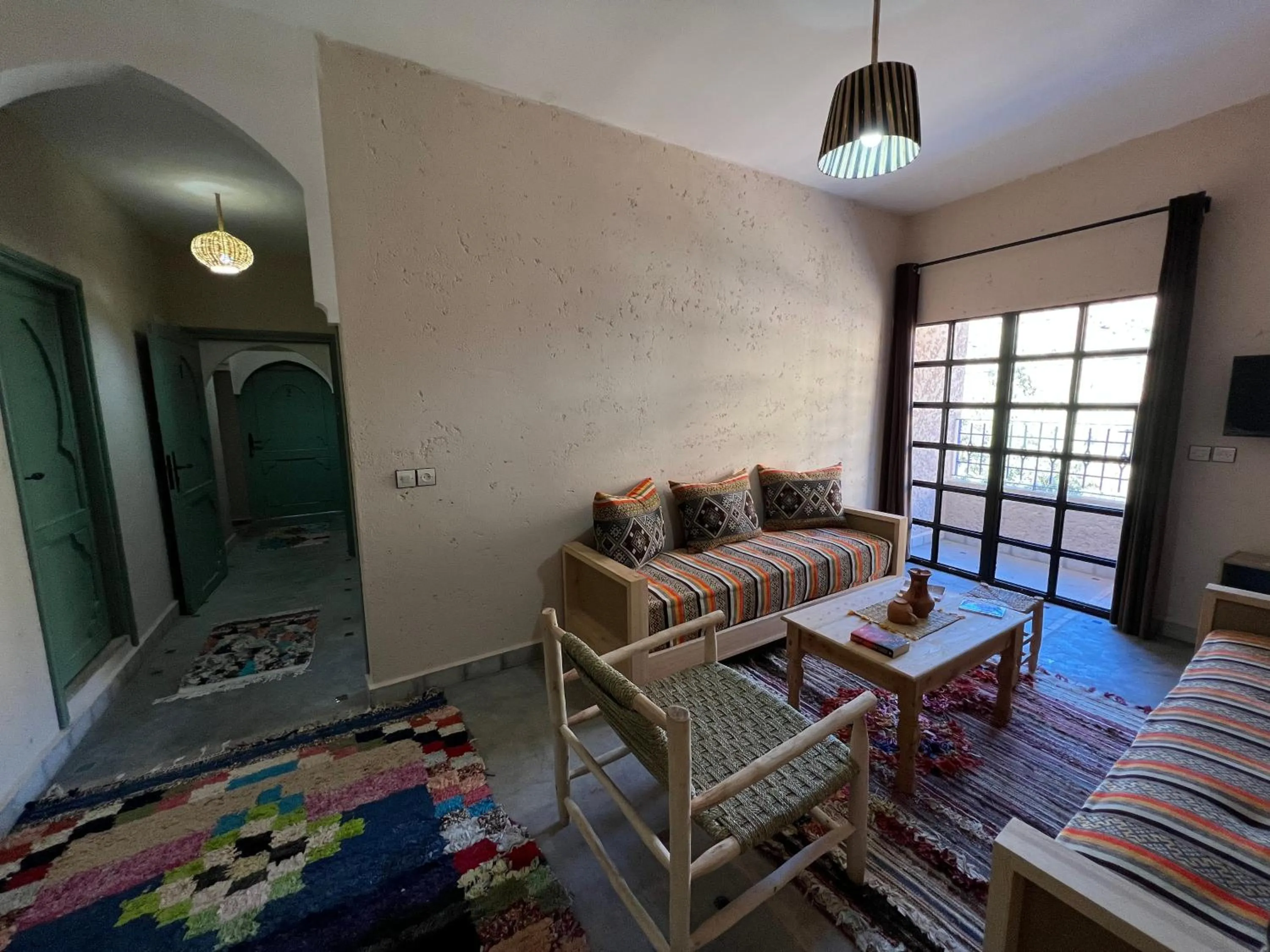 Living room, Bed in Tazart Lodge