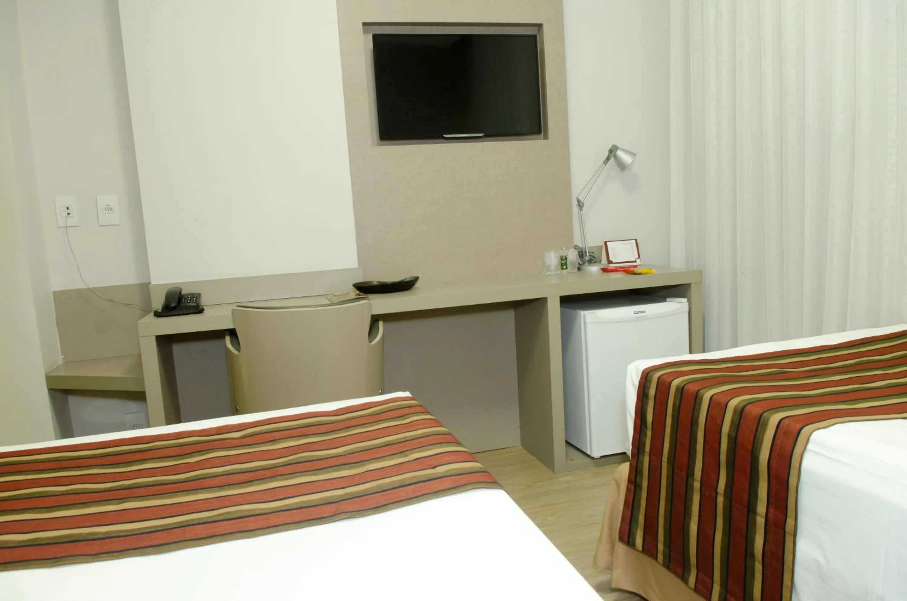 Bed in Hotel Beaga Convention Expominas by MHB