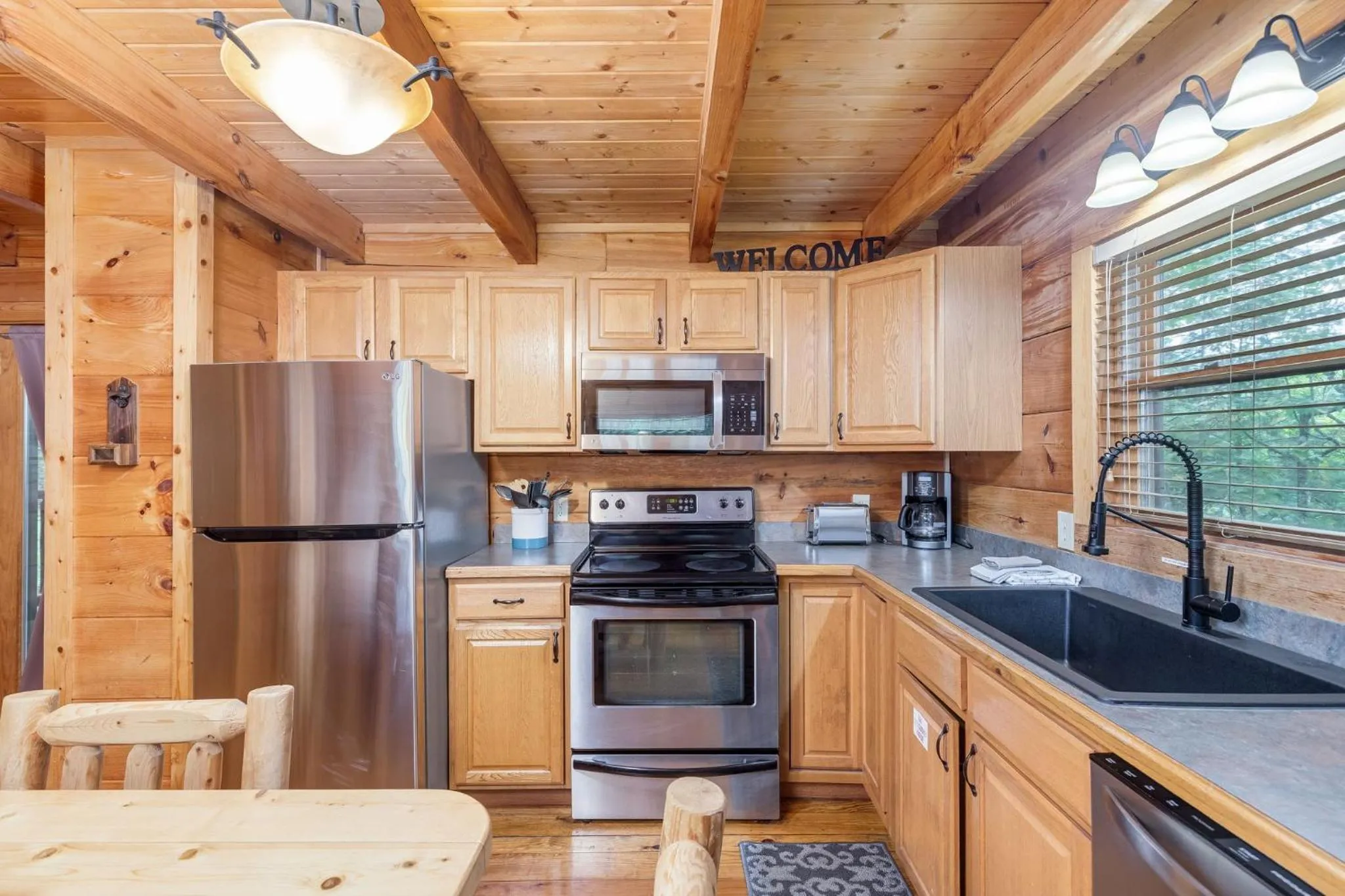 kitchen in Elegant & Cozy Cabin Near Pigeon Forge