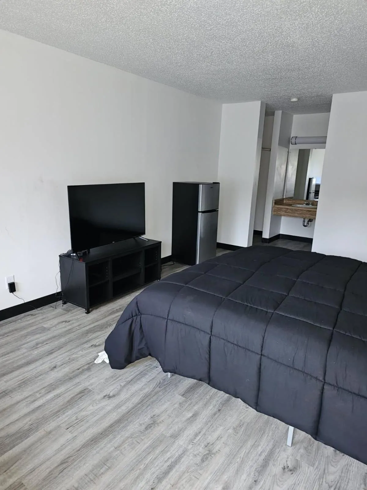 Communal lounge/ TV room, Bed in The Hastings Inn Parsons