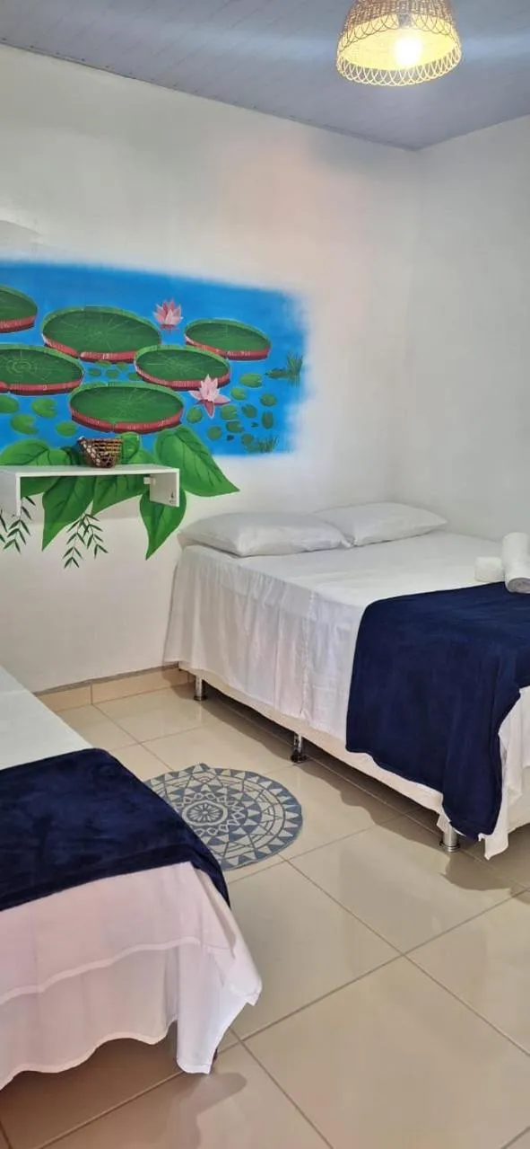 Bed in Pousada Angatu alter