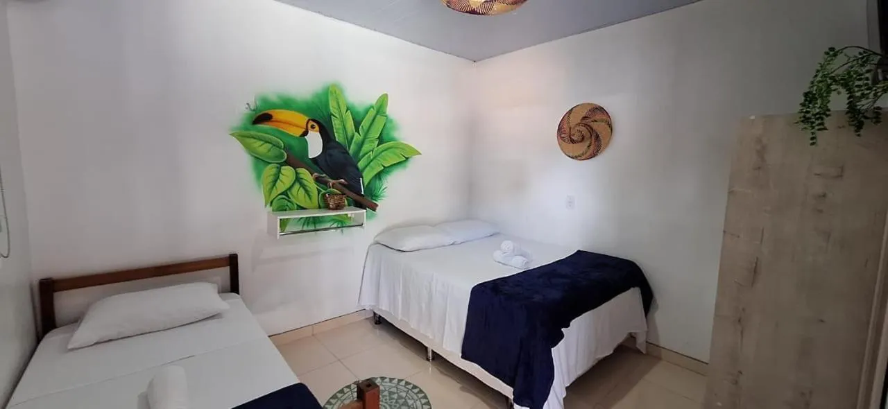 Bed in Pousada Angatu alter