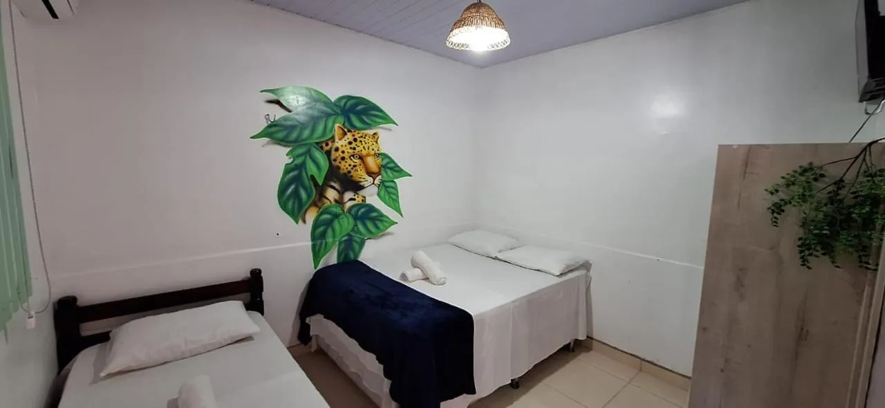 Bed in Pousada Angatu alter