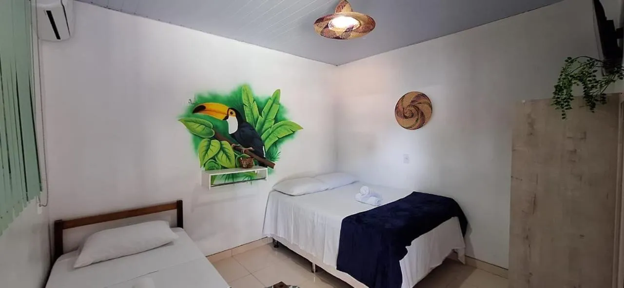 Bed in Pousada Angatu alter