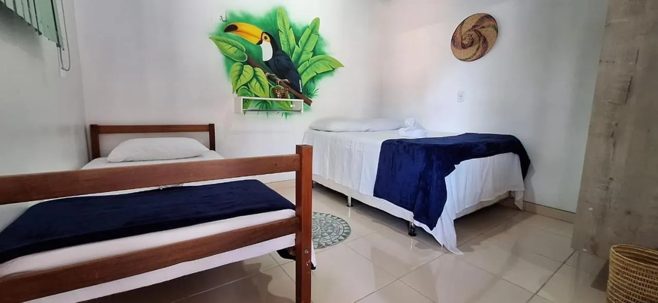 Bed in Pousada Angatu alter