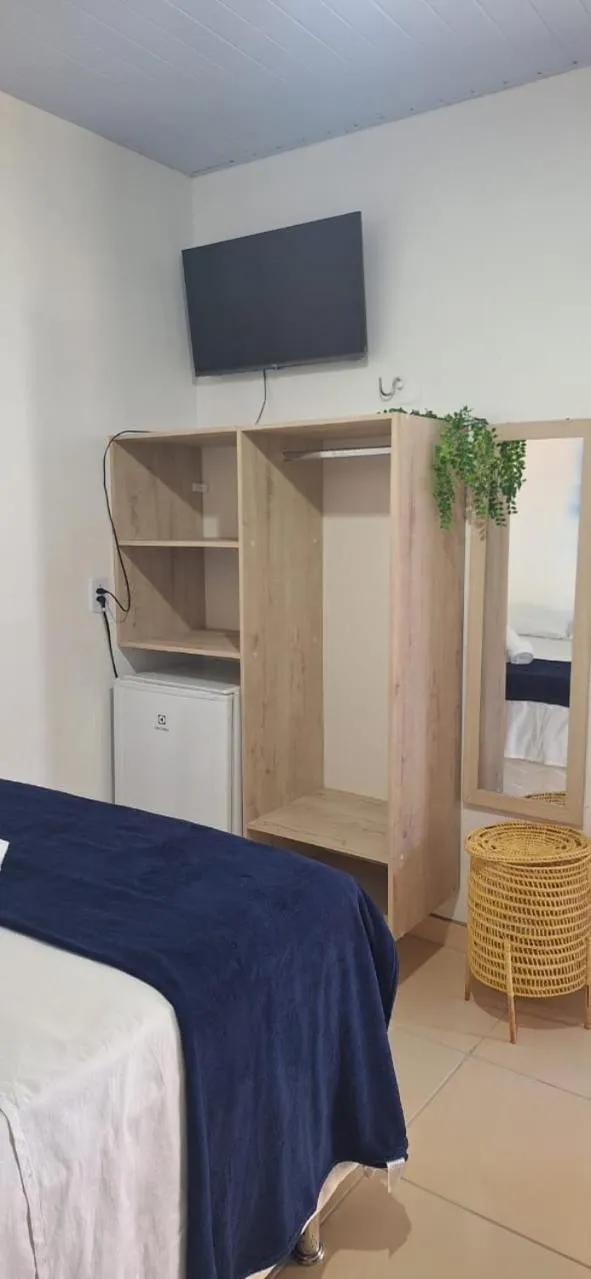 Bed in Pousada Angatu alter