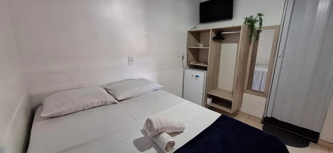 Bed in Pousada Angatu alter