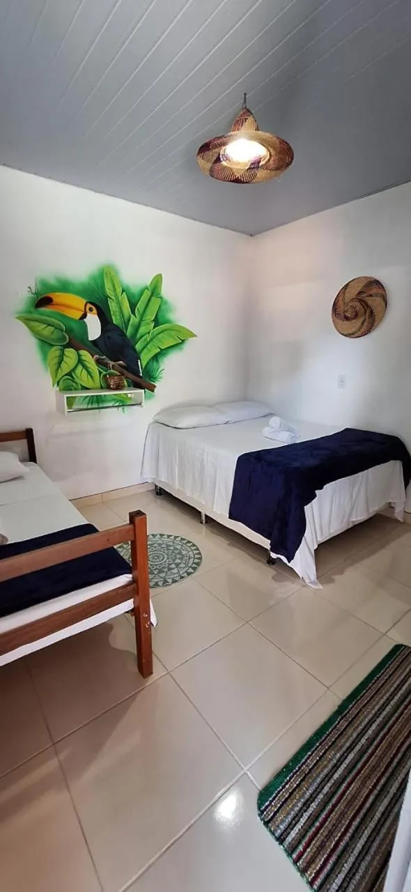 Bed in Pousada Angatu alter