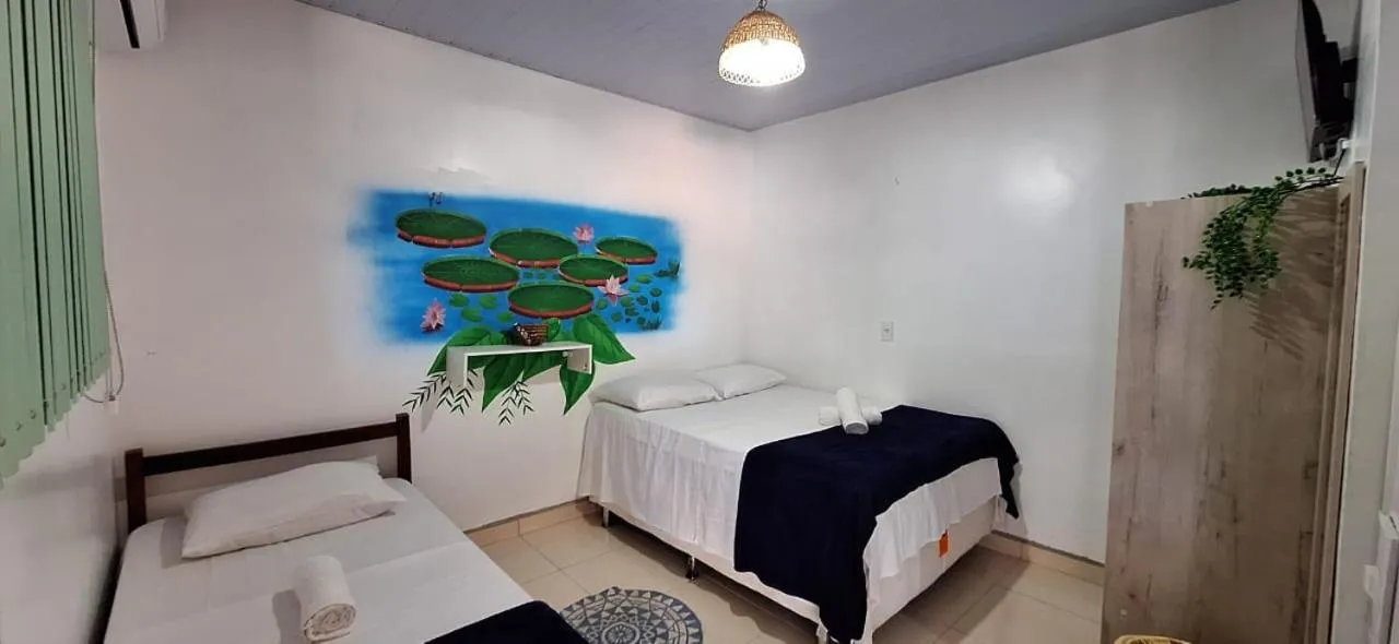 Bed in Pousada Angatu alter