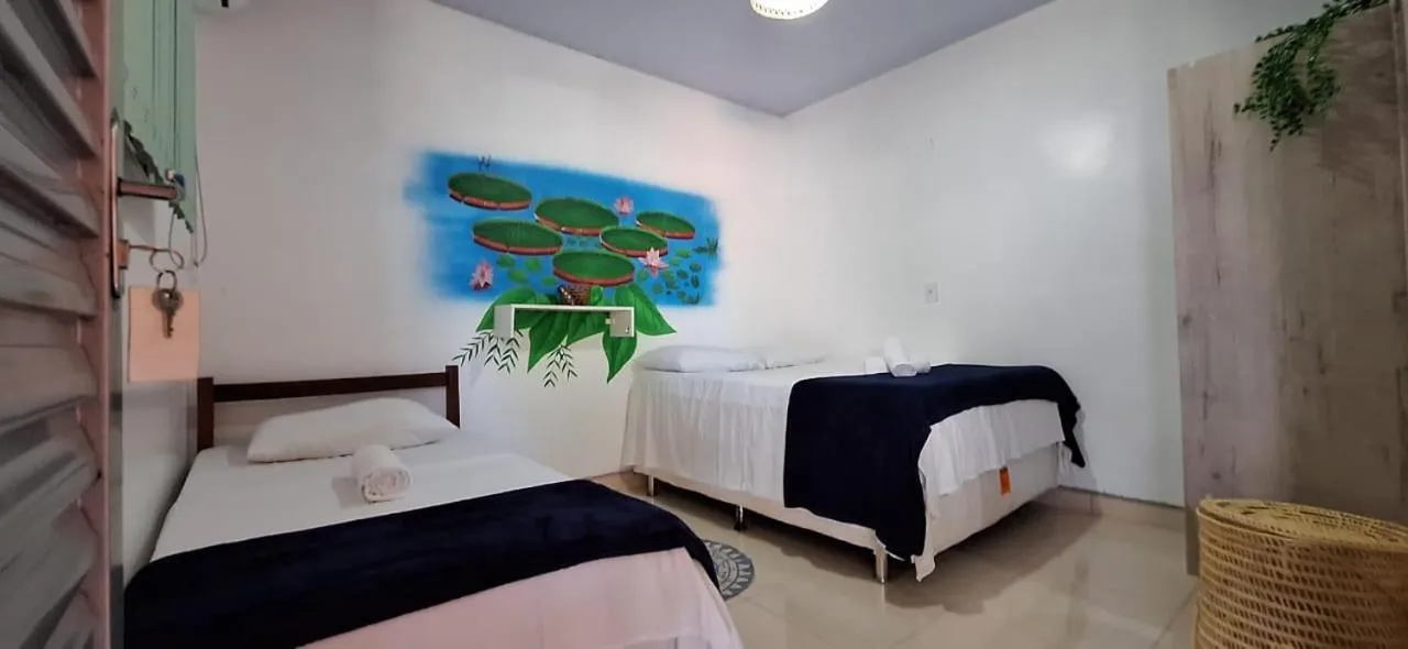 Bed in Pousada Angatu alter