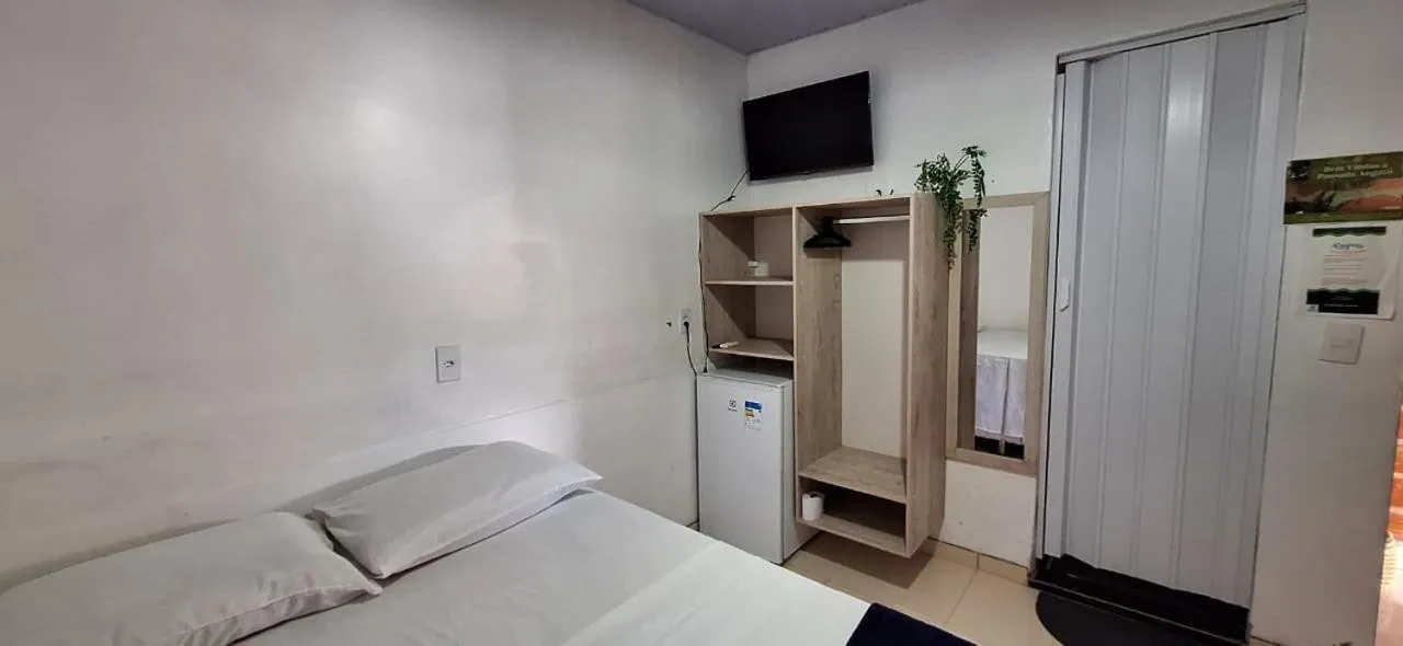 Bed in Pousada Angatu alter