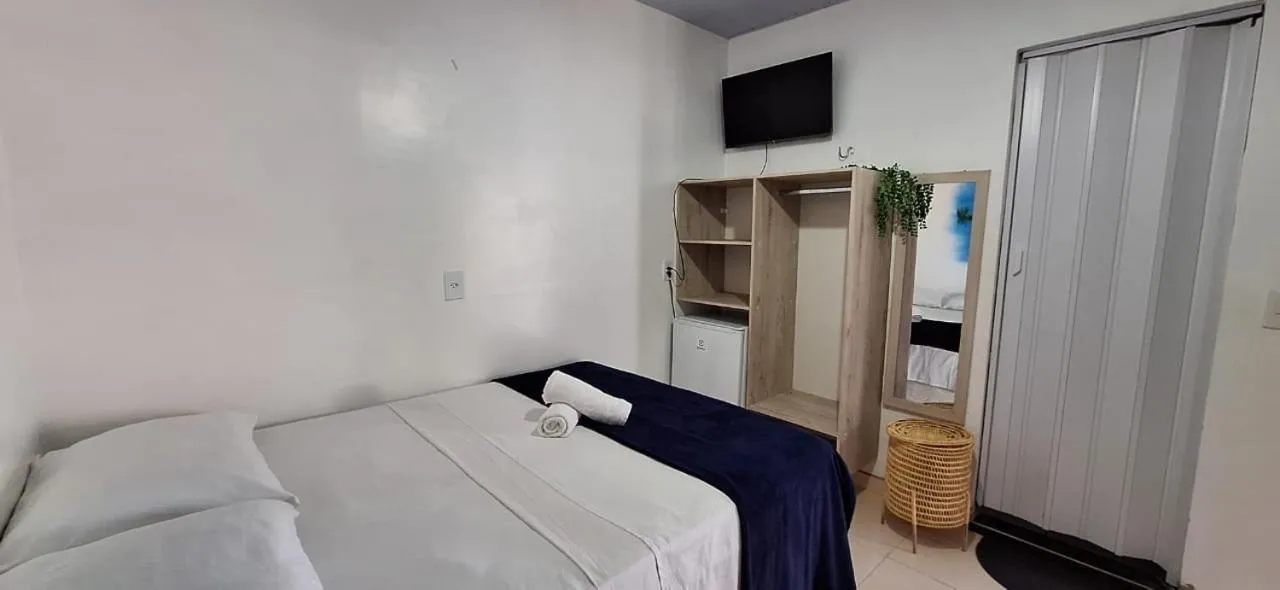 Bed in Pousada Angatu alter