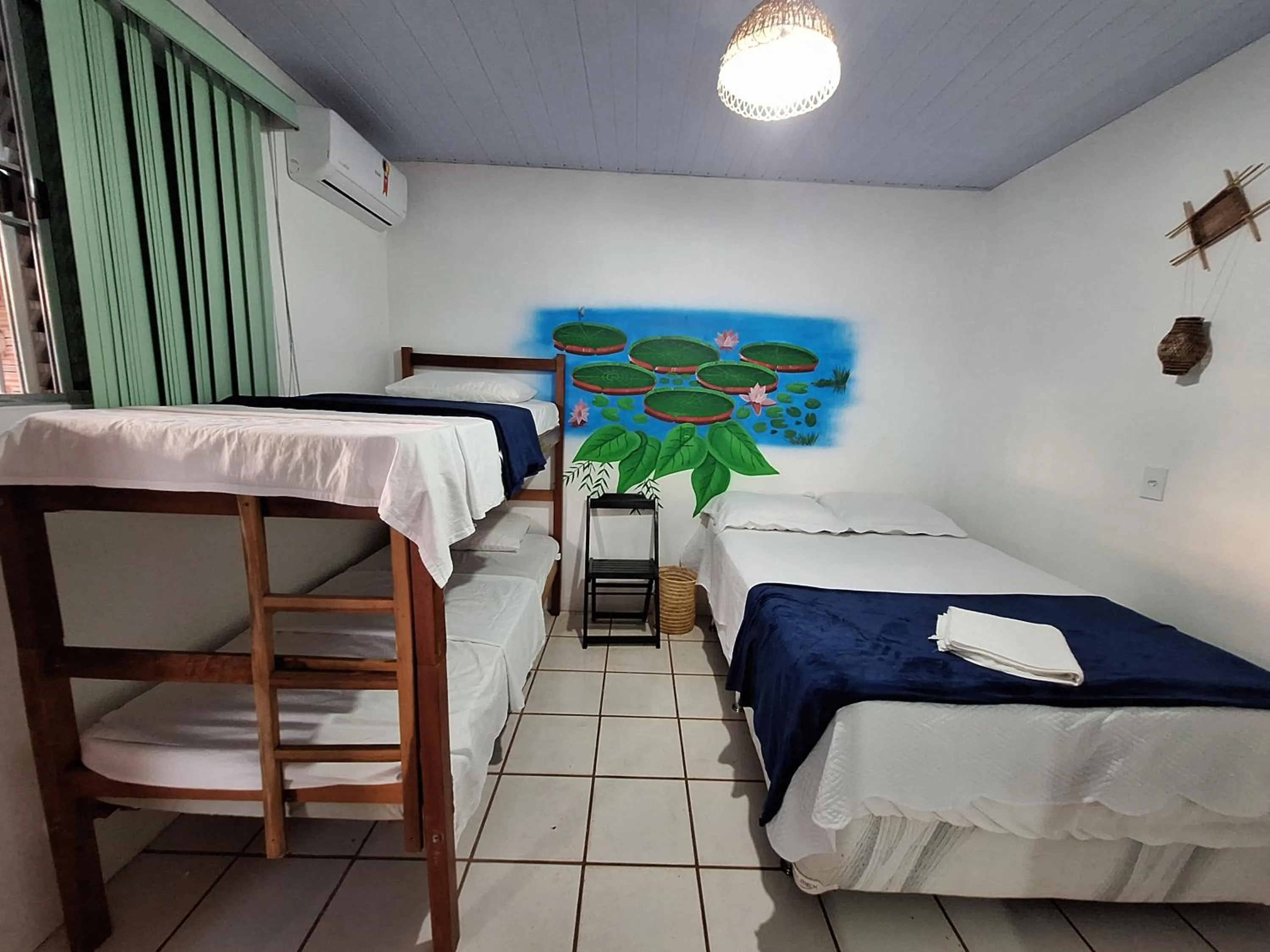 Bed in Pousada Angatu alter