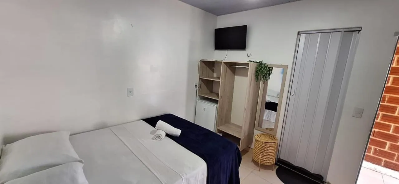 Bed in Pousada Angatu alter