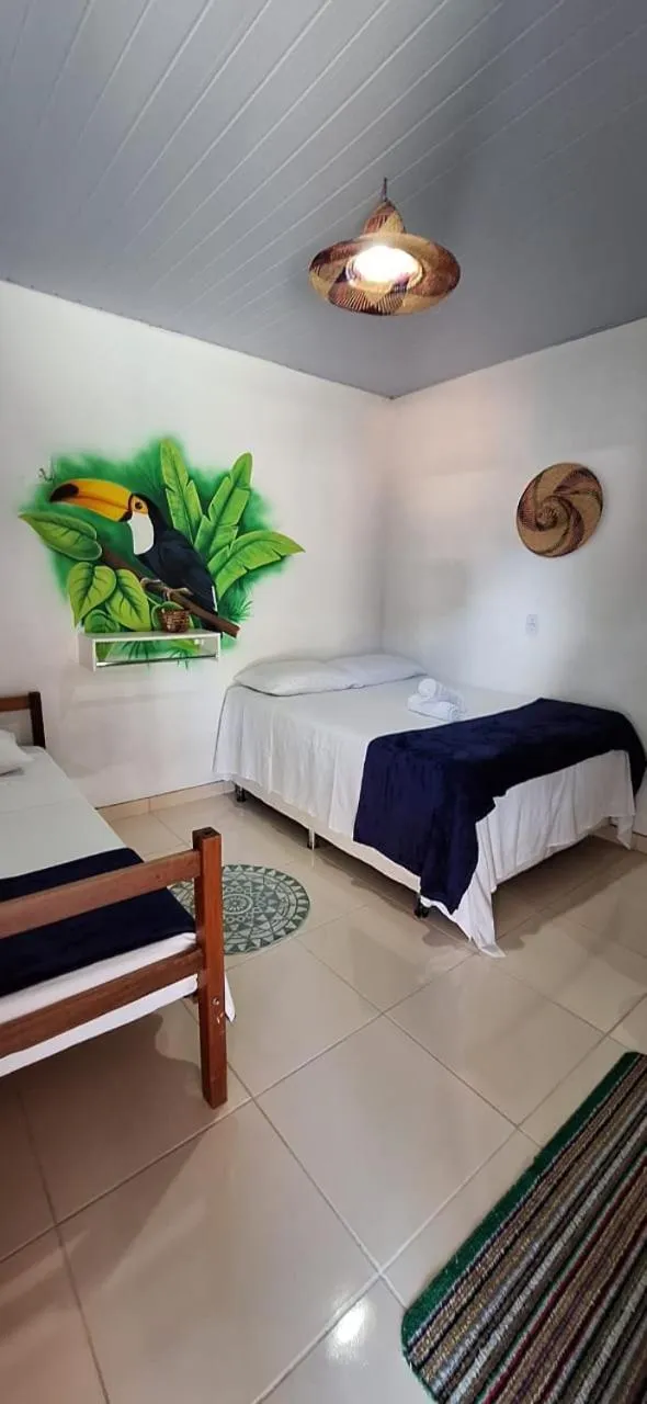 Bed in Pousada Angatu alter