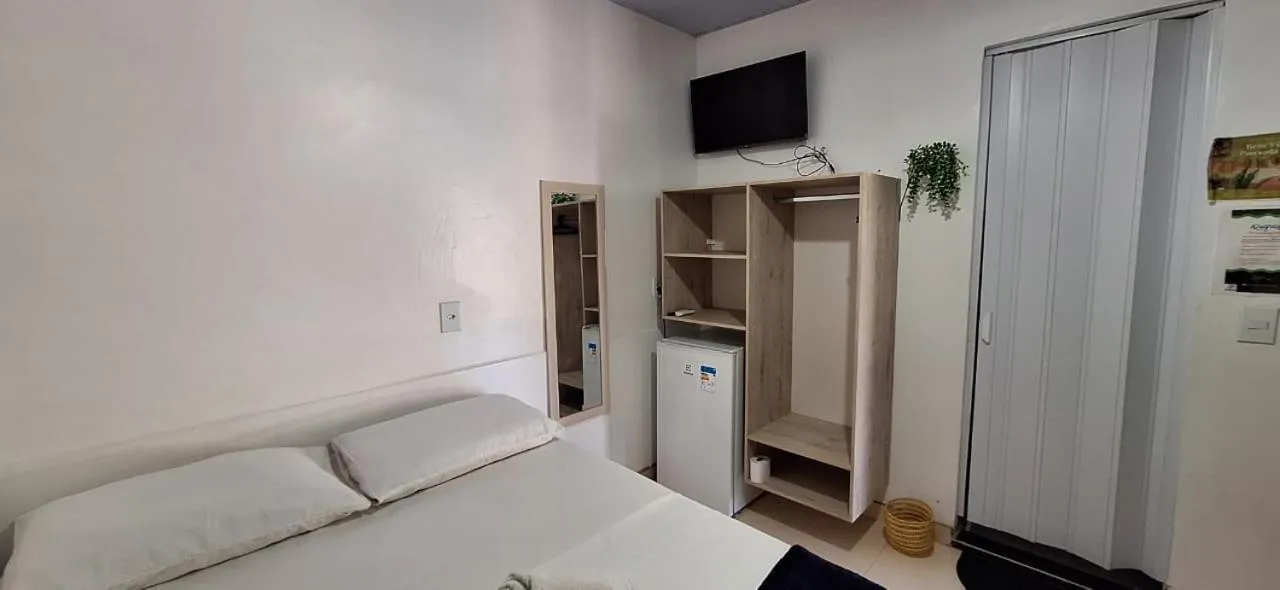 Bed in Pousada Angatu alter