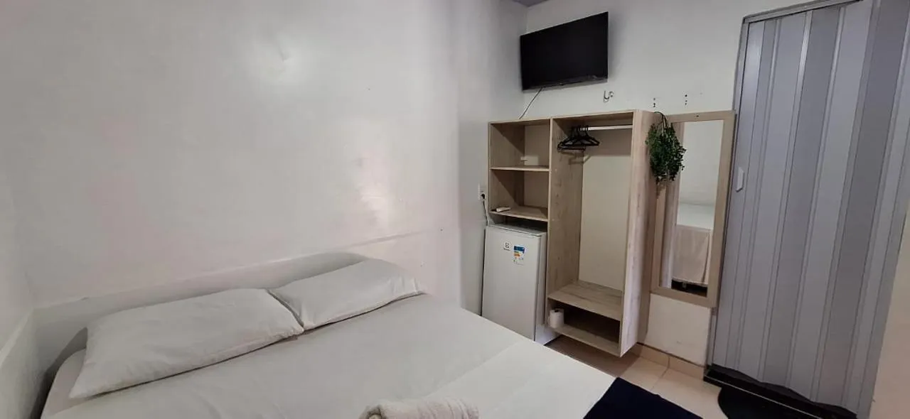 Bed in Pousada Angatu alter