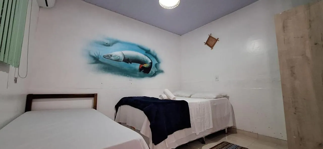 Bed in Pousada Angatu alter