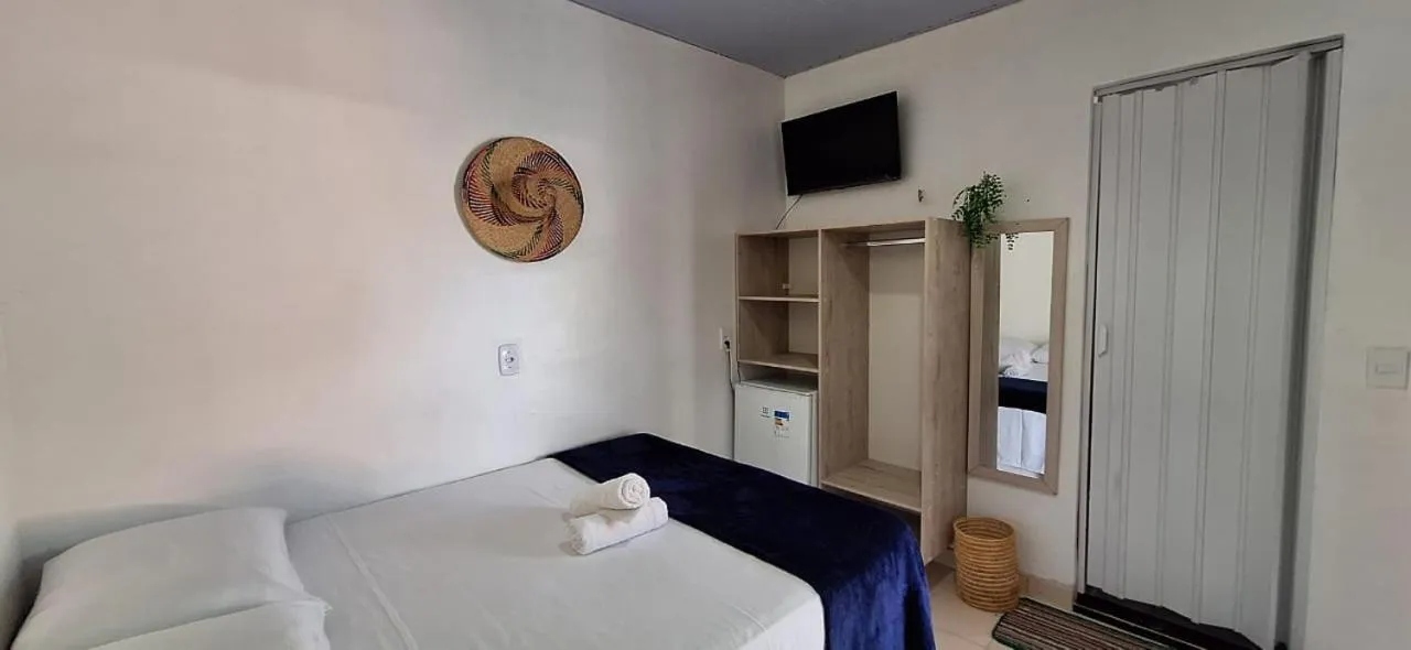 Bed in Pousada Angatu alter